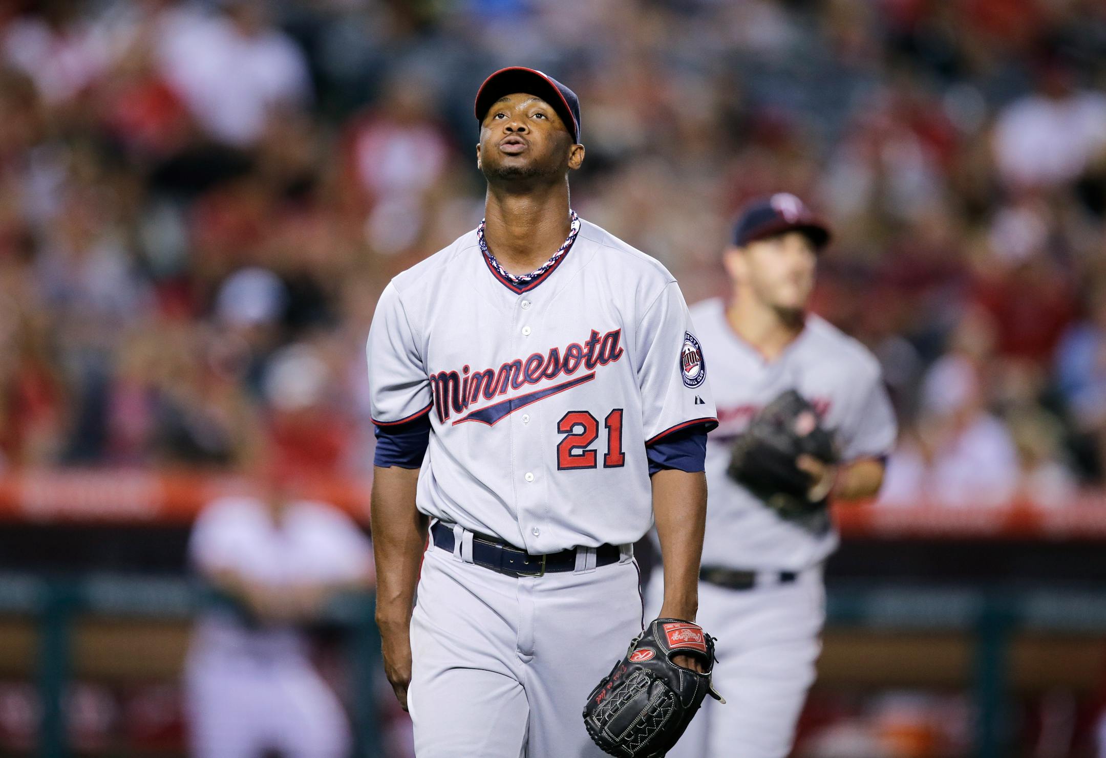 Twins starter Samuel Deduno let out a sigh of relief after getting the Angels' Howie Kendrick to ground into a double play in the third inning Monday night. Deduno allowed two runs and four hits over seven innings to improve to 6-4.