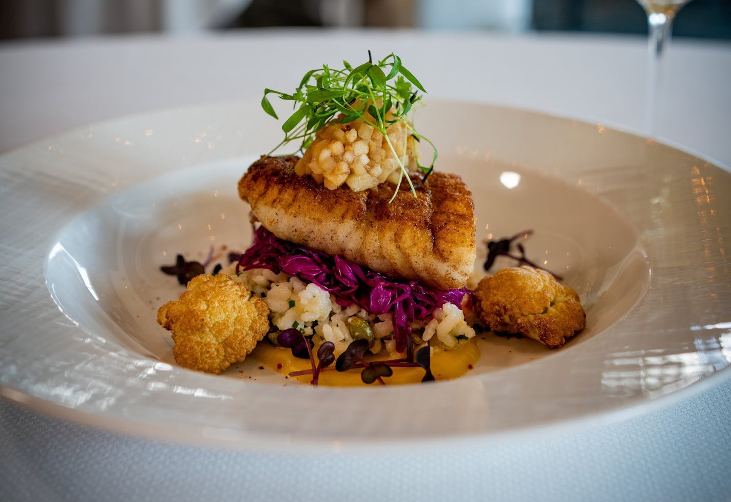 Restaurant L is known for sophisticated cuisine such as this halibut dish. (Nicholas Scarpelli)