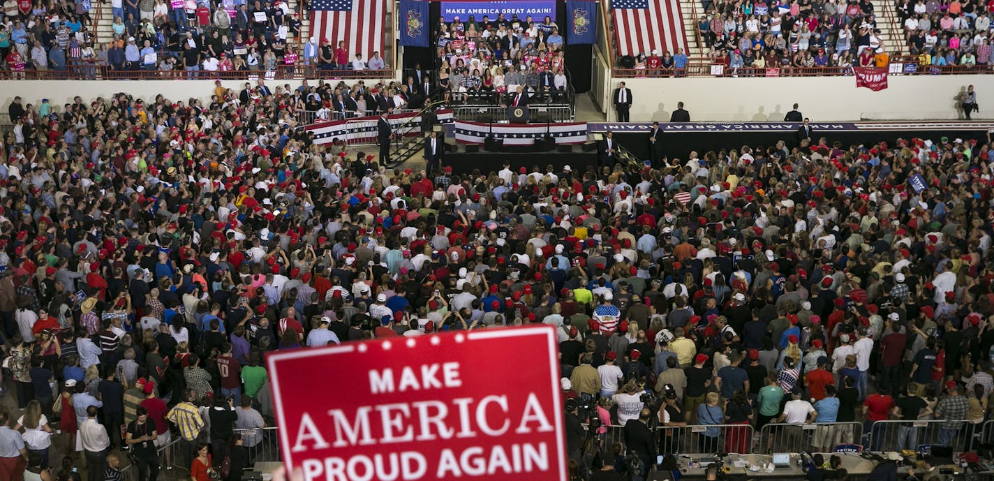 President Donald Trump, at center of the stage, during a campaign-style rally at the Pennsylvania Farm Show Complex & Expo Center, in Harrisburg, Pa., April 29, 2017. Trump began his Saturday night rally with attacks on the news media, before giving himself oversize credit for accomplishments, and followed a similar pattern in an interview with CBS&#x2019;s &#x201c;Face the Nation&#x201d; that aired Sunday morning. (Al Drago/The New York Times) ORG XMIT: MIN2017050210481214