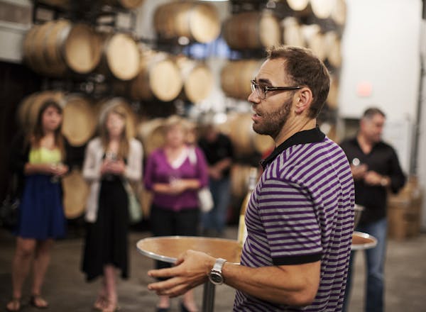 Winemaker Justin Osborne leads a tasting tour at Four Daughters Vineyard and Winery in Spring Valley.
