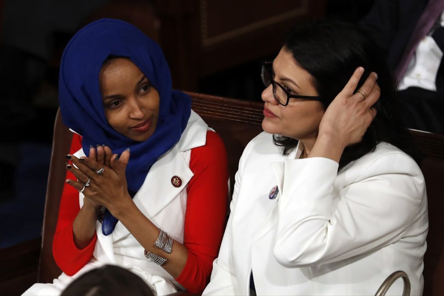 Reps. Ilhan Omar and Rashida Tlaib listened as President Donald Trump delivered his State of the Union address in February.