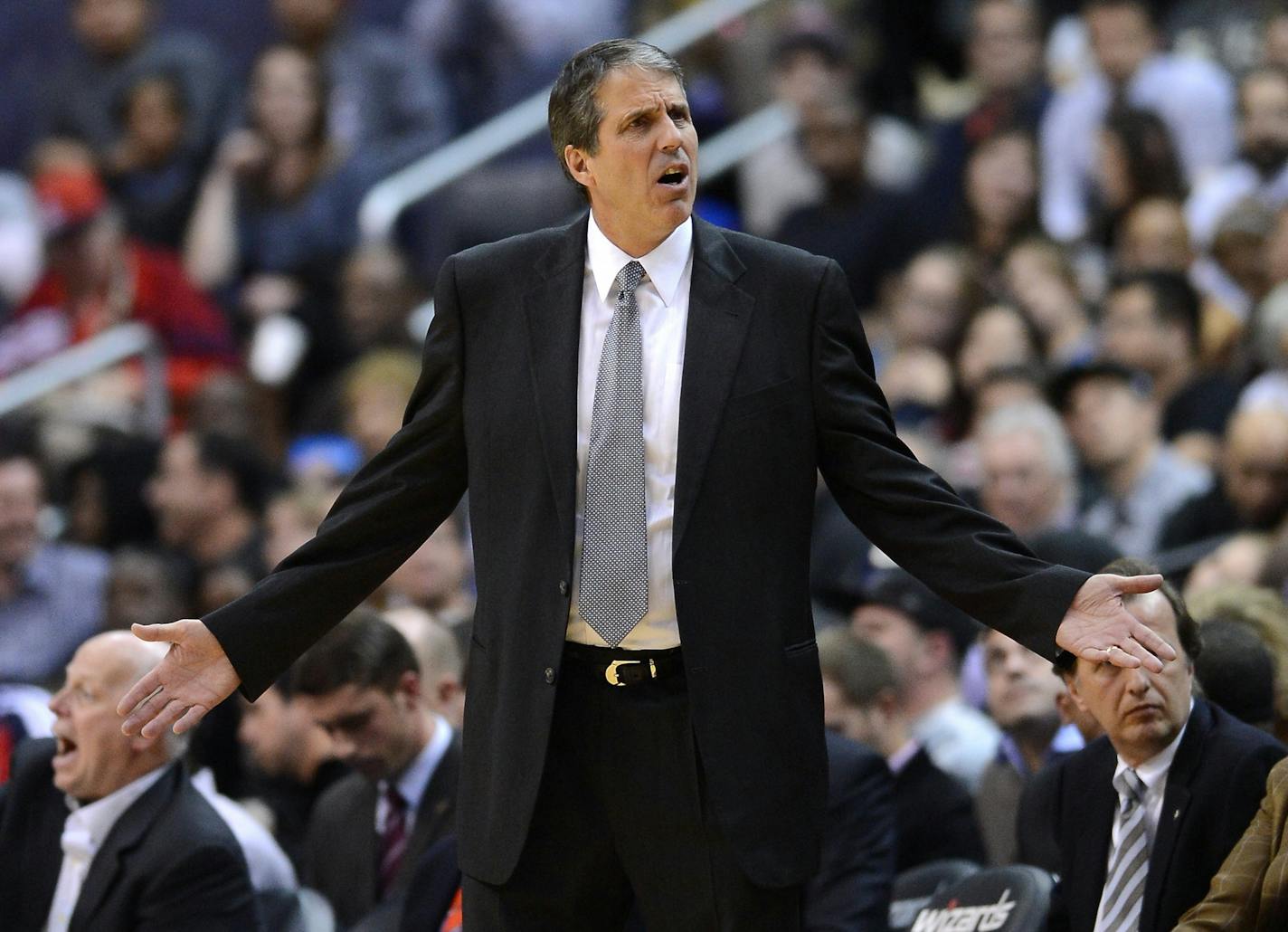 Washington Wizards head coach Randy Wittman complains to a referee about a call in the fourth quarter against the Minnesota Timberwolves at the Verizon Center in Washington, Tue., Nov 19, 2013. The Wizards defeated the Timberwolves, 104-100.