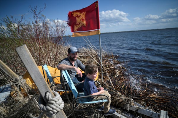 John Carlson and son Sutton, 4, enjoyed the lakeside setting at home in New York Mills, Minn.