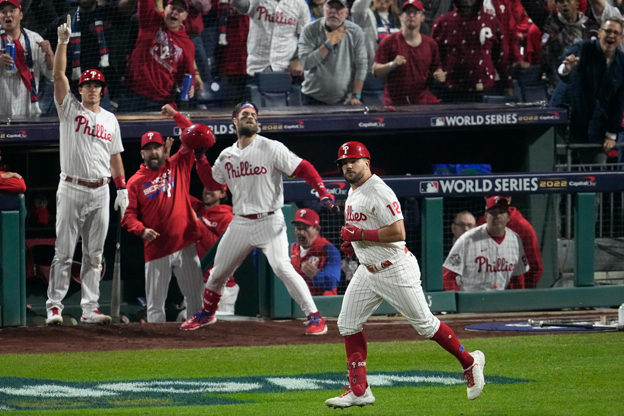 Philadelphia Phillies' Kyle Schwarber watches his two-run home run during the fifth inning in Game 3 of baseball's World Series between the Houston Astros and the Philadelphia Phillies on Tuesday, Nov. 1, 2022, in Philadelphia. (AP Photo/Matt Rourke)