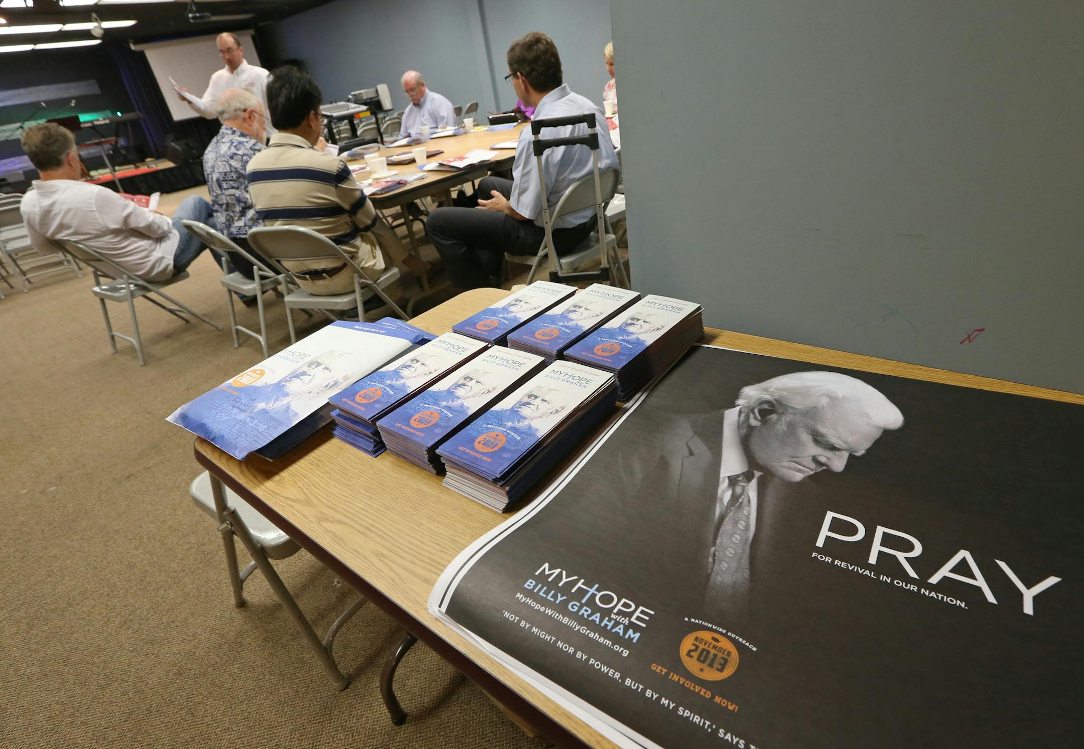 Justin Hoover, with the "My Hope with Billy Graham" led a training session of chruch pastors and lay leaders from throughout the metro area at the Redeeming Love Church in Maplewood, on 7/25/13. Evangelicals across Minnesota and other states are preparing to participate in the historic celebration of Billy Graham's 95th birthday in November. In the coming weeks, Evangelical churches throughout the state will be holding training sessions, where they will guide followers in how to share their fait