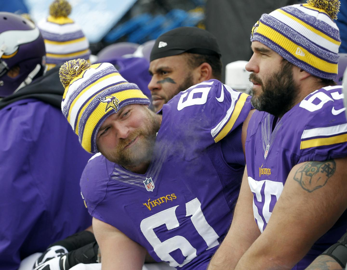 Vikings center John Sullivan, right