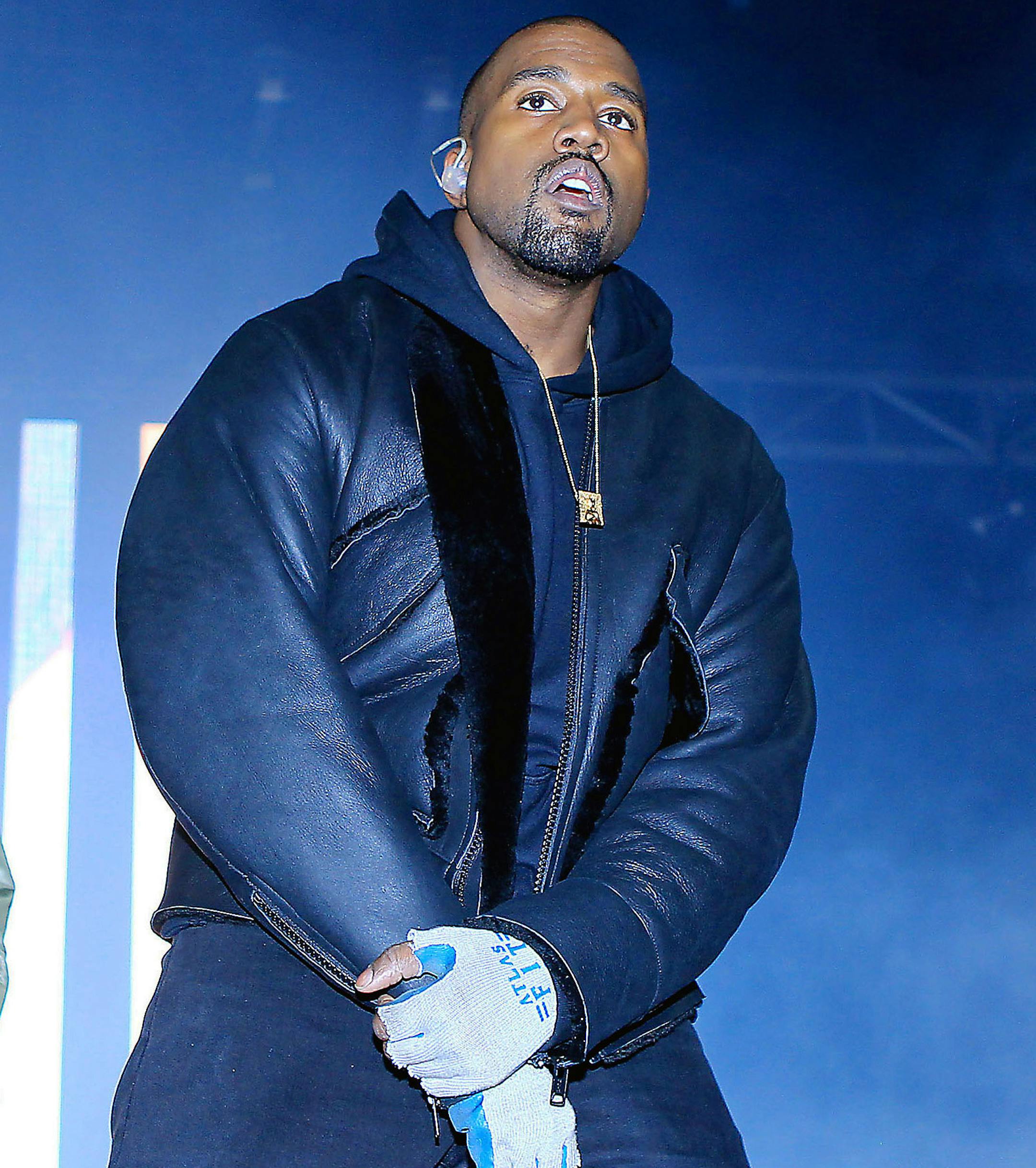 This image released by Starpix shows Kanye West performs at the first annual Roc City Classic in New York's Flatiron District on Thursday, Feb. 12, 2015. (AP Photo/Starpix, Dave Allocca)
