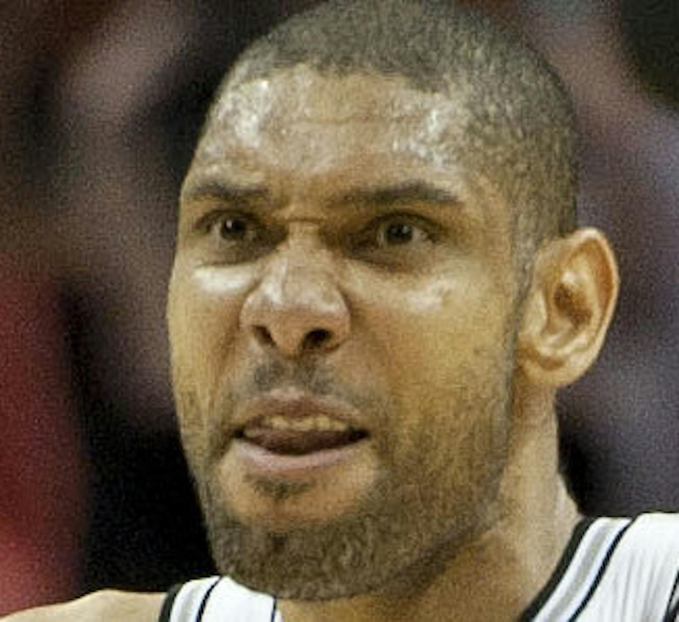 San Antonio Spurs' Tim Duncan (21) celebrates the winning basket during the second half of an NBA basketball game against the Los Angeles Clippers, Friday, March 29, 2013, in San Antonio. The Spurs won 104-102. (AP Photo/Darren Abate) ORG XMIT: MIN2013032922565697