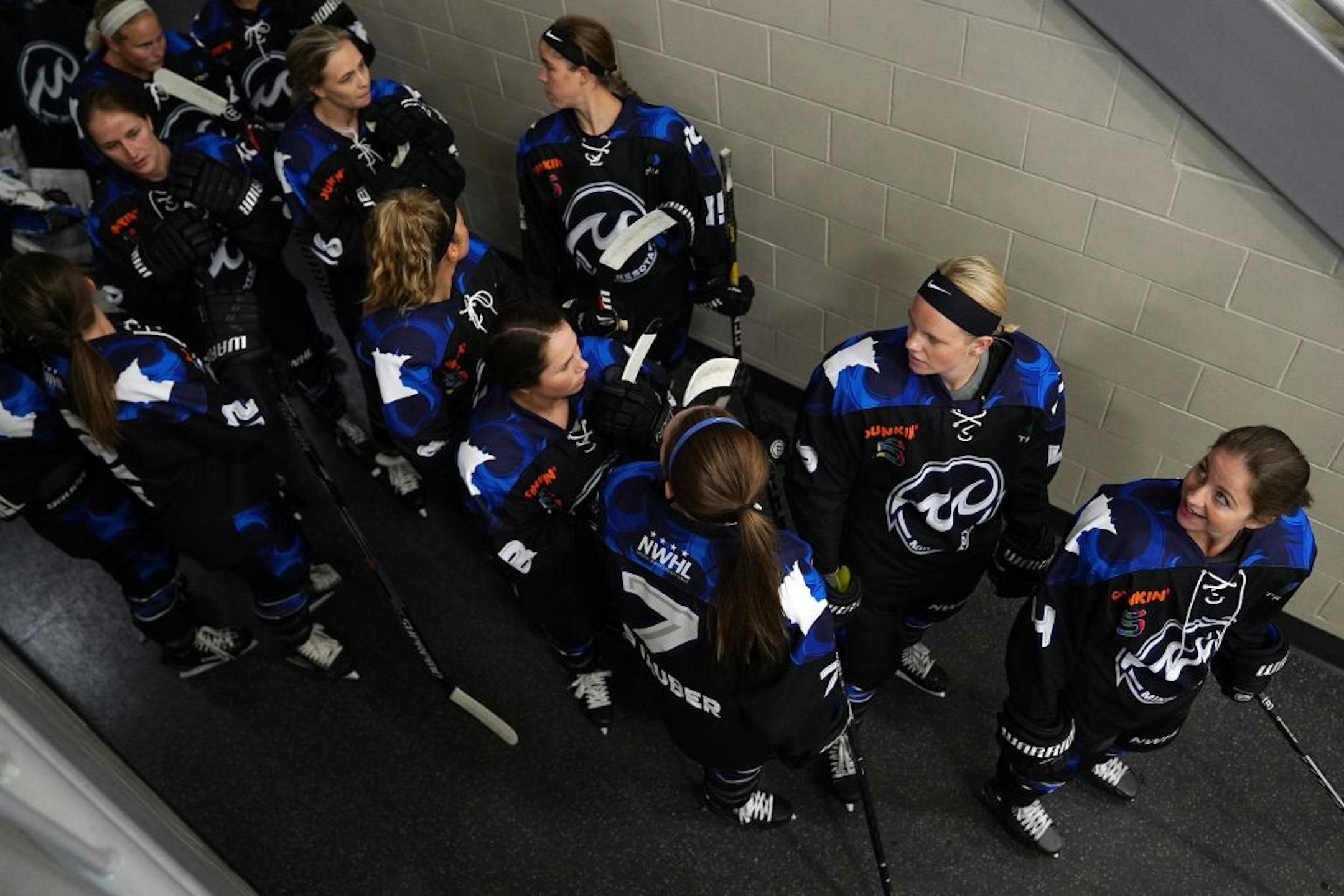 Whitecaps players waited to take the ice ahead of Saturday's game against the Metropolitan Riveters.