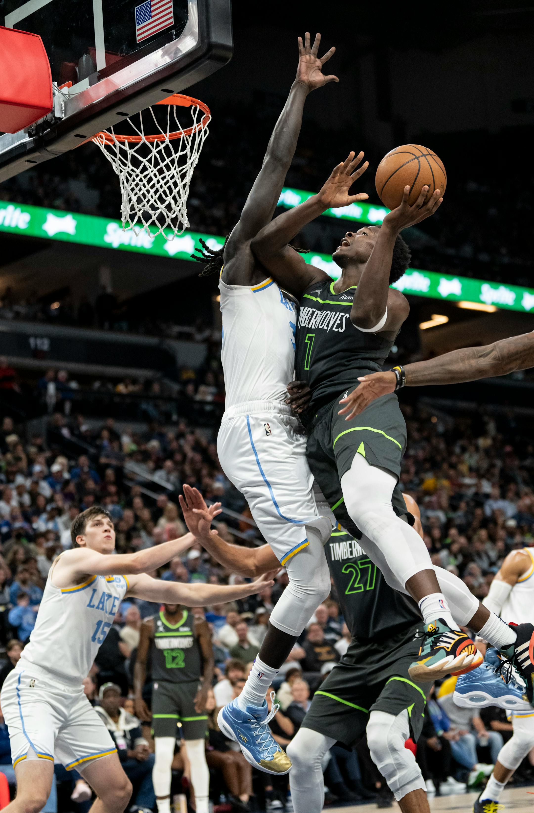 Minnesota Timberwolves forward Anthony Edwards (1) jumps for a two-point shot in the fourth quarter.