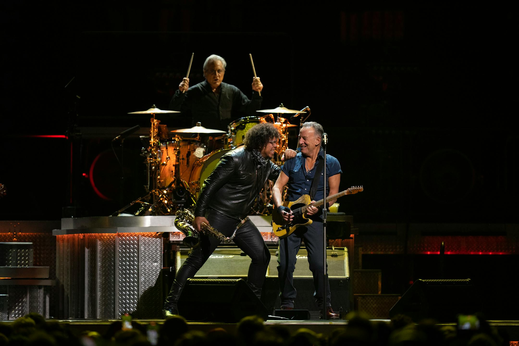 Bruce Springsteen with saxophonist Jake Clemons and drummer Max Weinberg early in their set.