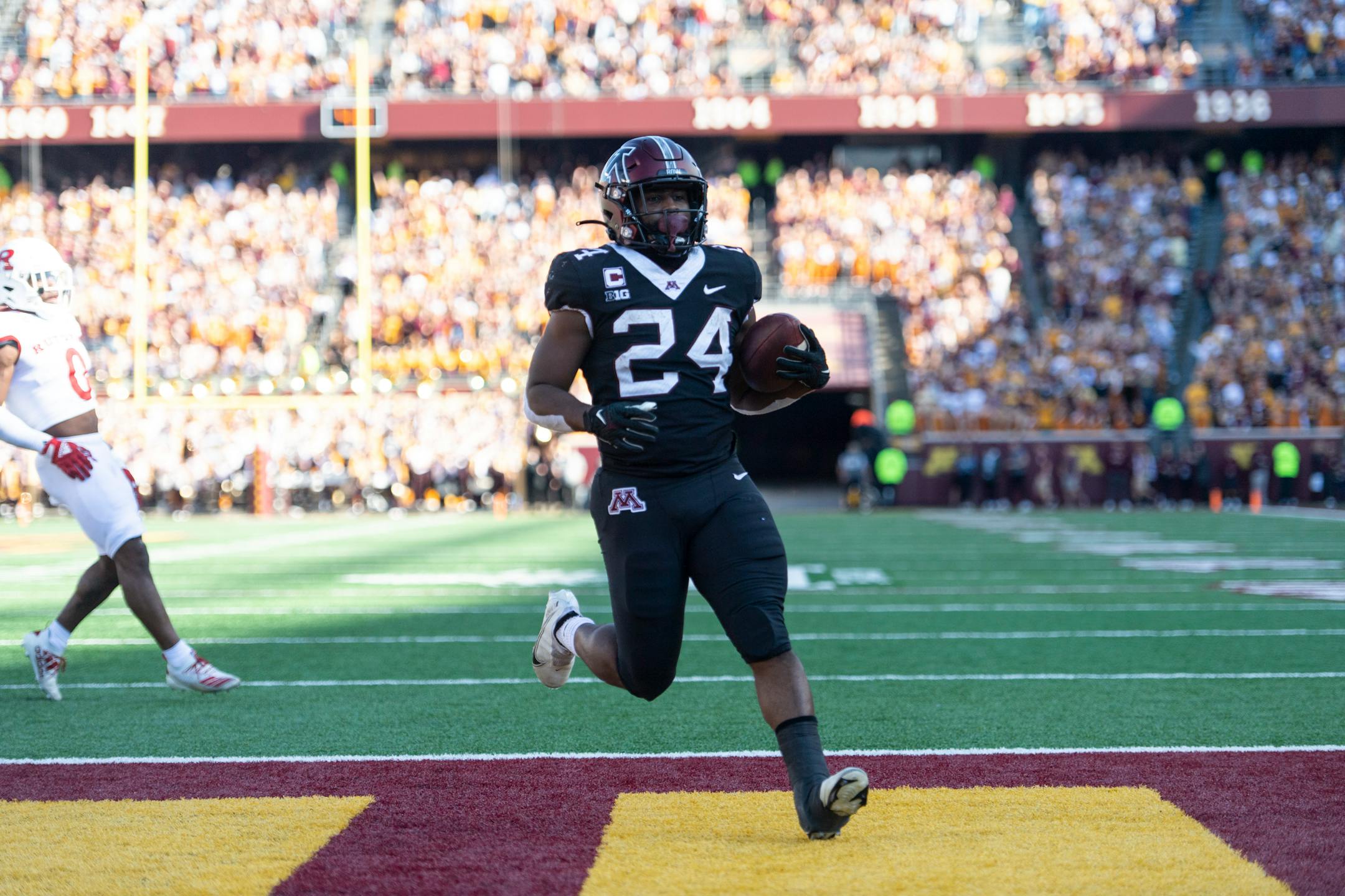 Minnesota Golden Gophers running back Mohamed Ibrahim (24) runs for a touchdown during the second quarter.