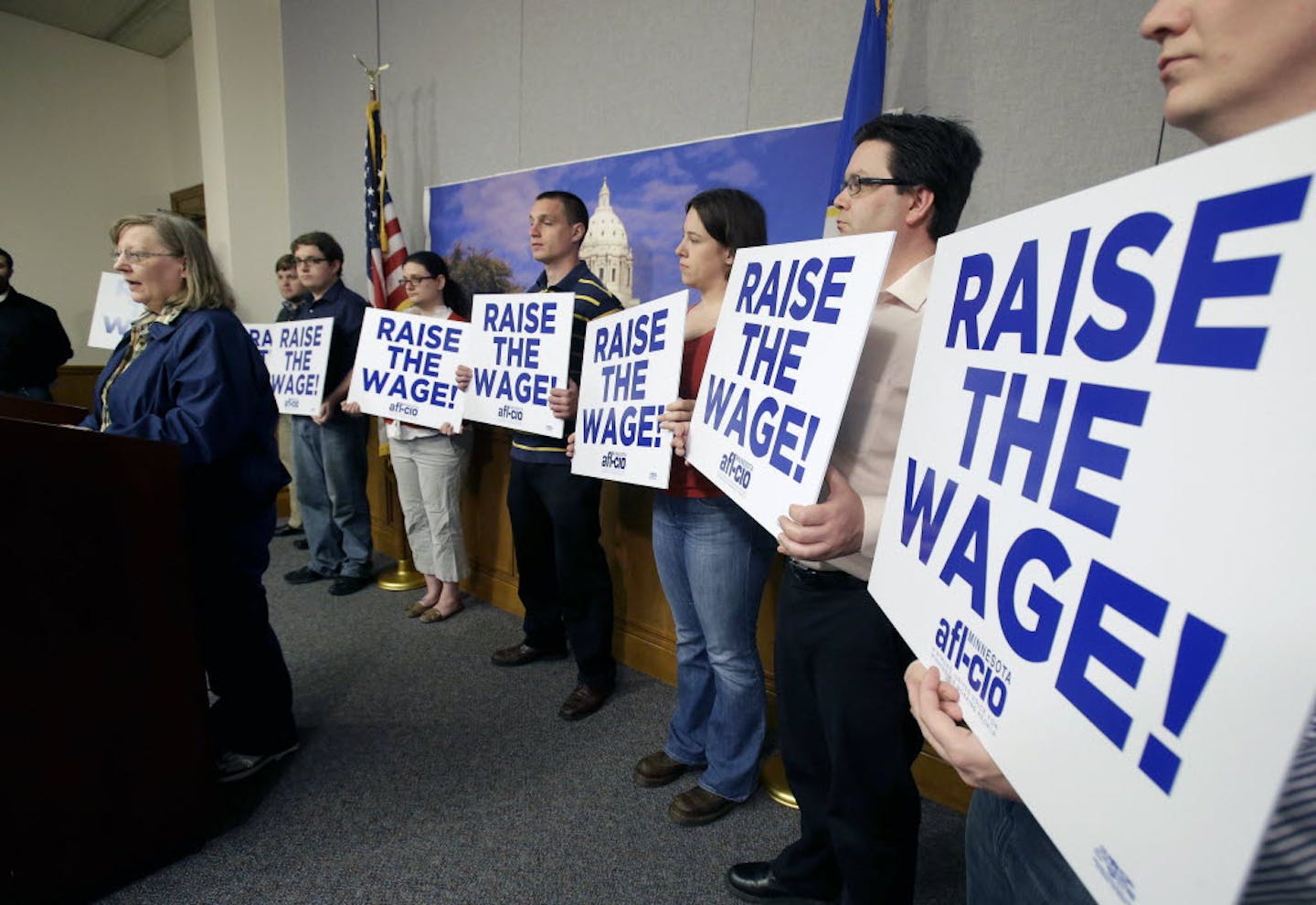 Barbara Johnson, owner of Lyle's Cafe in Winthrop, Minn., speaks in support of a bill to raise Minnesota's minimum wage.