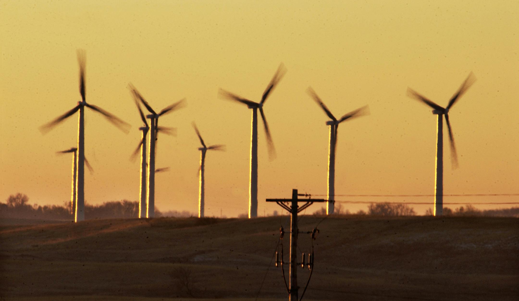 WEDNESDAY_11/12/03_Hendricks - - - - - - Wind generators turning atop the Buffalo Ridge between Hendrick and Lake Benton at sunrise. ORG XMIT: MIN2014060218205148 ORG XMIT: MIN1406051544161142