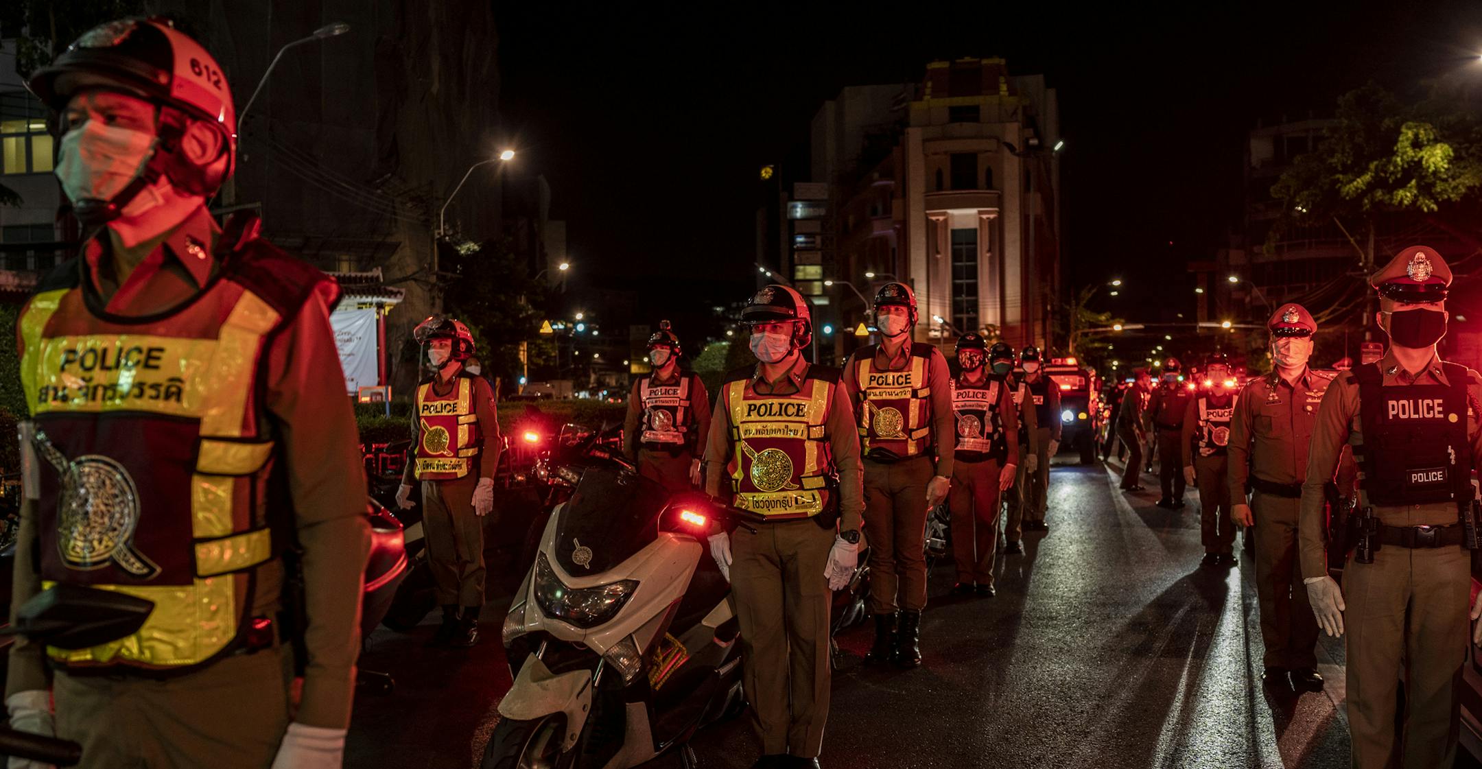Police officers in Bangkok were on alert at a checkpoint inspection area for the coronavirus.