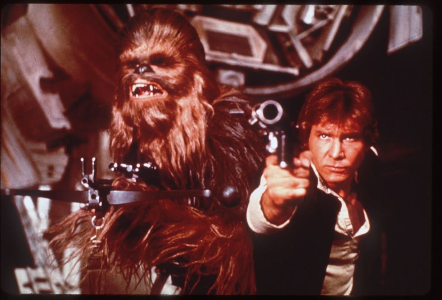 Harrison Ford, right, as Han Solo and Peter Mayhew as Chewbacca in an image from the 1977 release of "Star Wars."