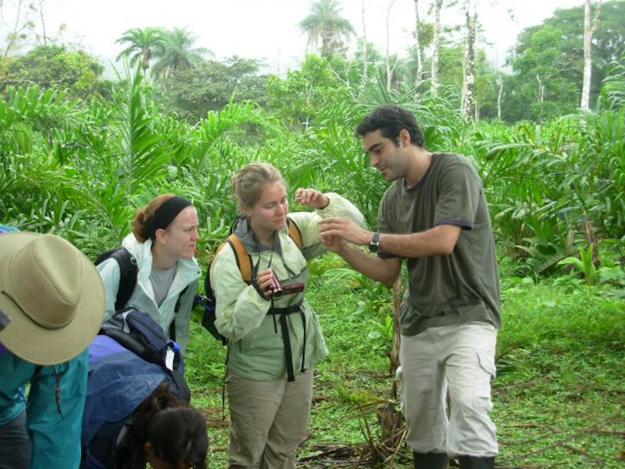 While doing field research, students are introduced to their first soilder leaf cutter ant. Pictured: Sarah Morinville, Leeja Miller and Adrian Pinto.