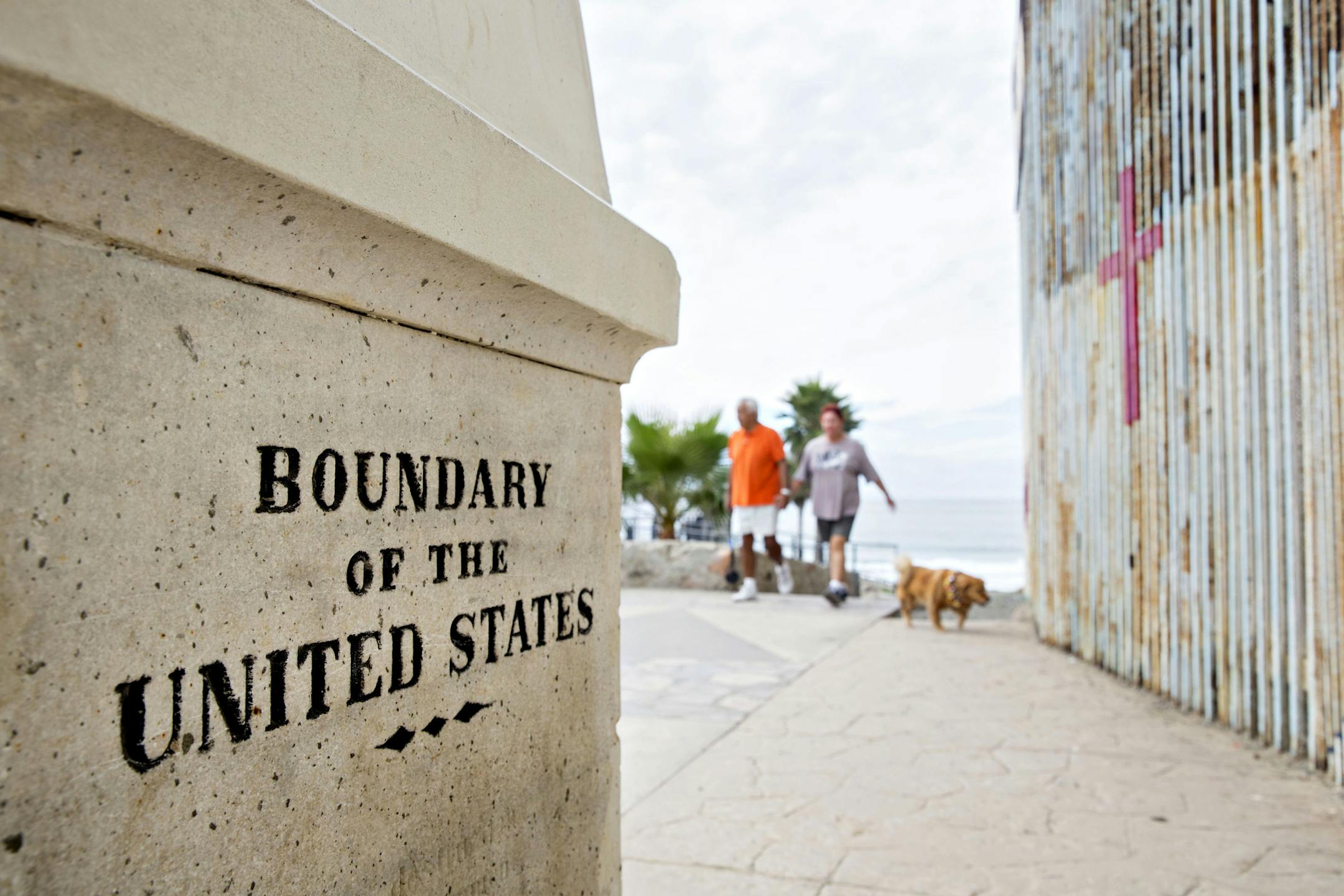 A boundary monument stands along the U.S.-Mexico border fence in Tijuana, Mexico.
