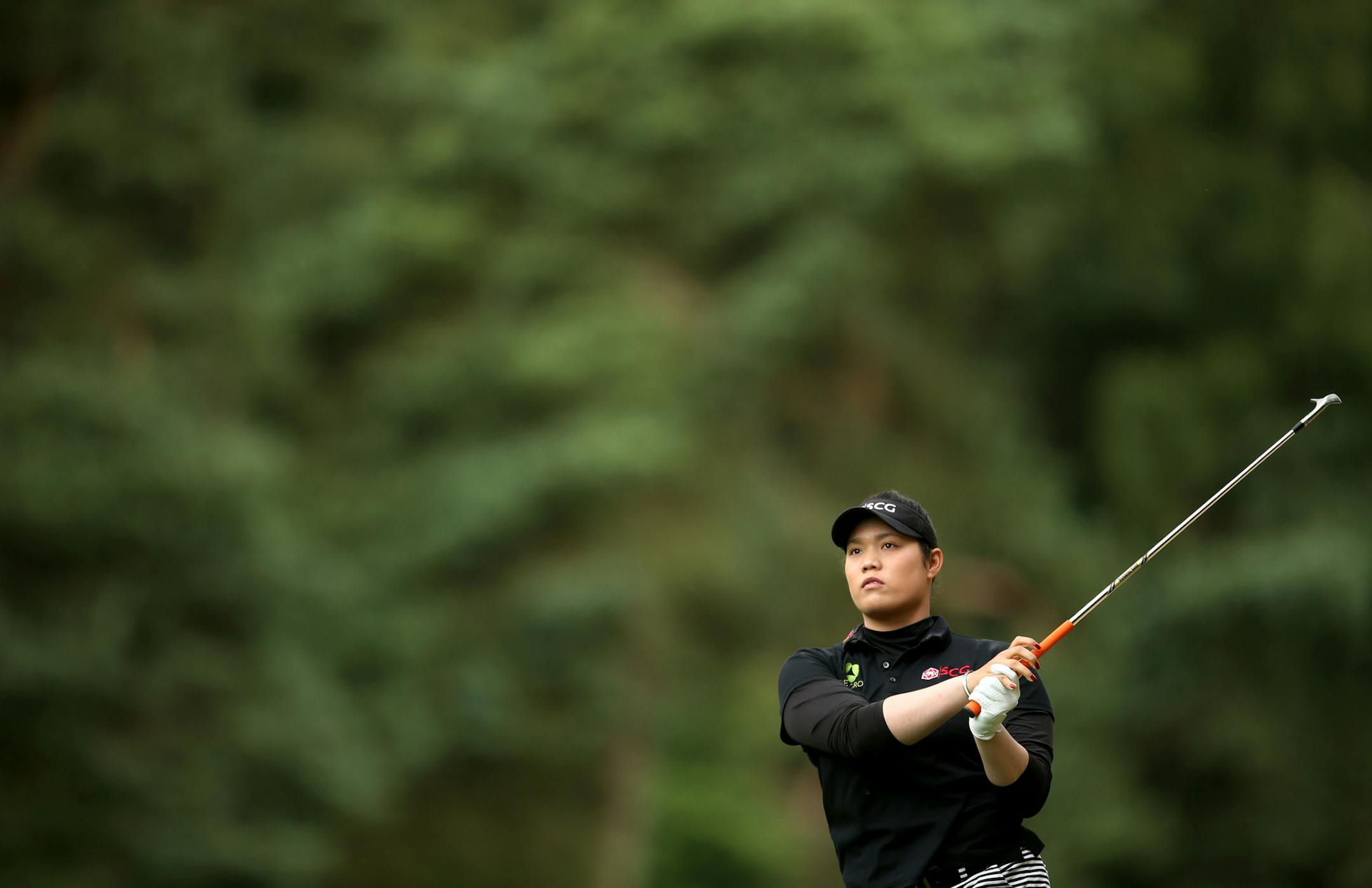 Thailand's Ariya Jutanugarn watches the flight of her ball during day four of the Women's British Open at Woburn Golf Club, Woburn, England, Sunday July 31, 2016. (Steve Paston / PA via AP)