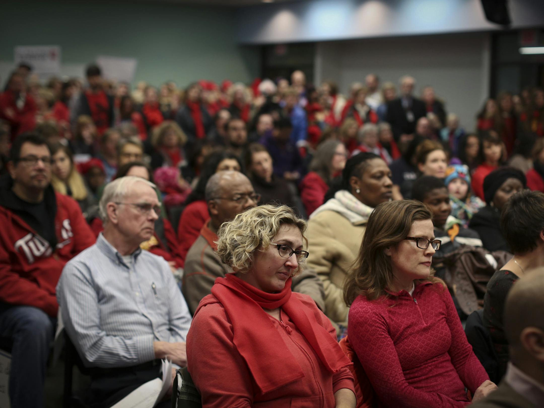 A large crowd squeezed into the school board chambers for the St. Paul School District meeting.
