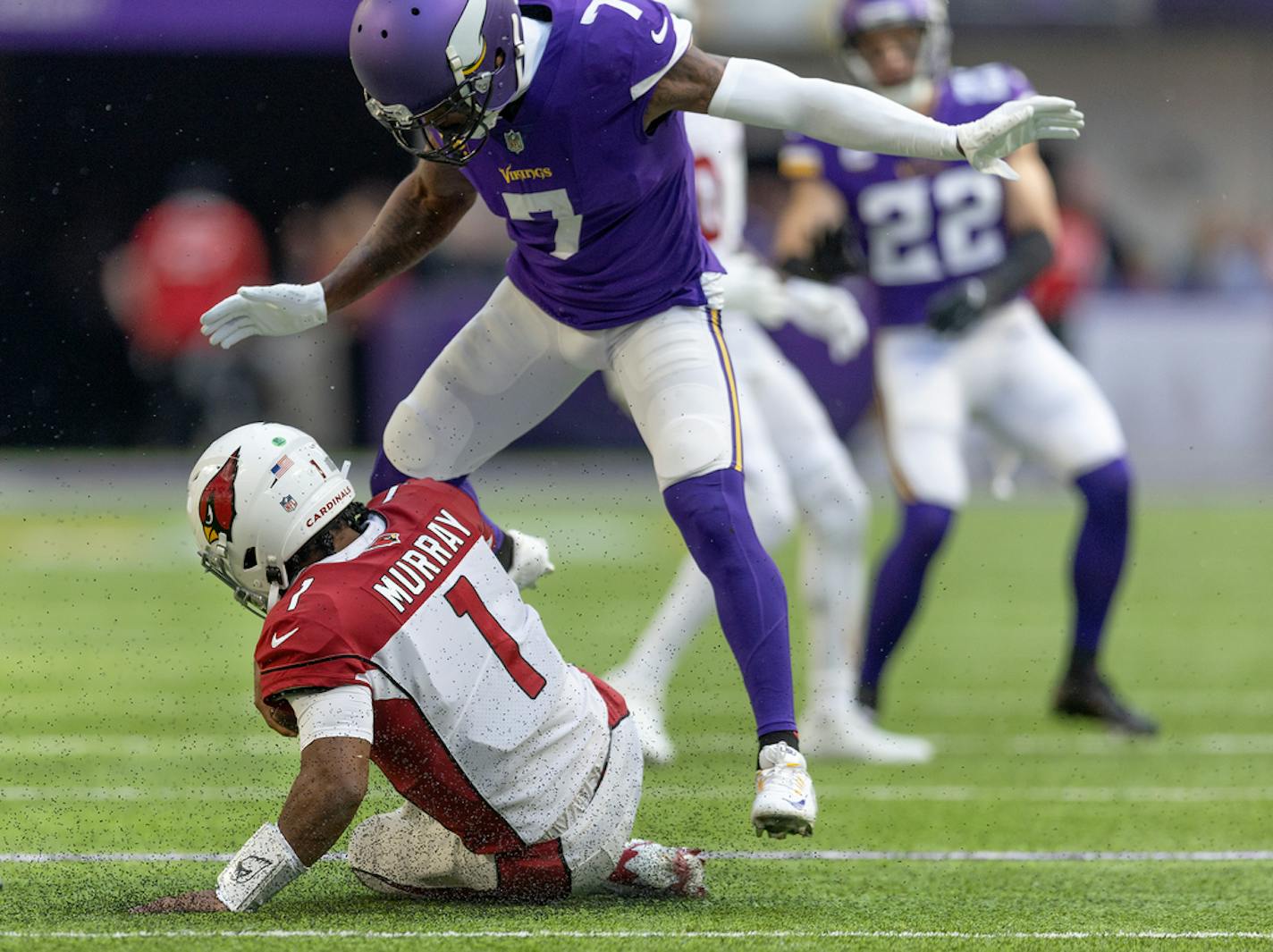 Cardinals quarterback Kyler Murray (1) slid under Vikings cornerback Patrick Peterson (7) are not the best of friends.