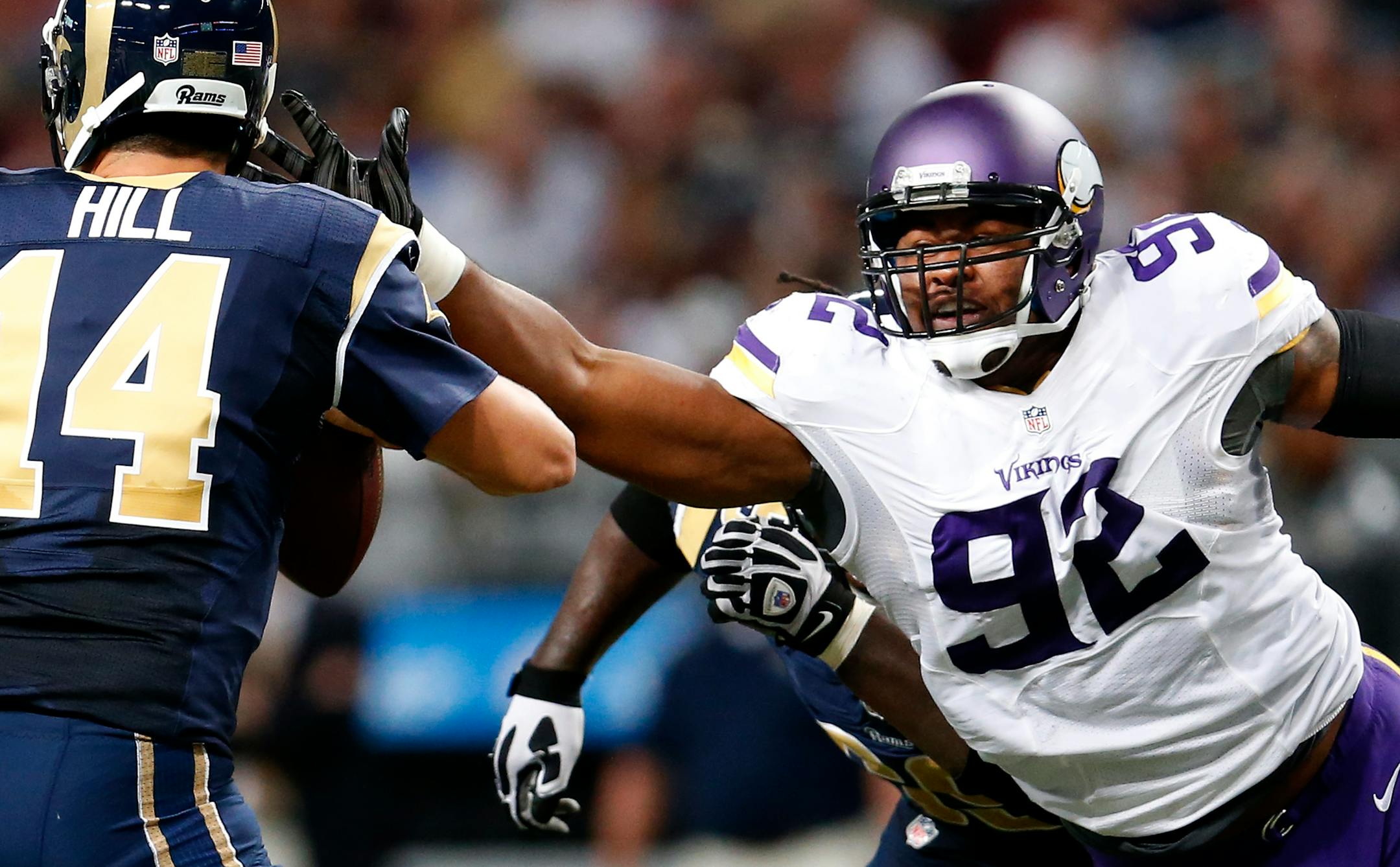 The Vikings have re-signed defensive tackle Tom Johnson (92), who had a career year in 2014, to a three-year contract worth $7 million, including $3 million guaranteed, according to a league source.