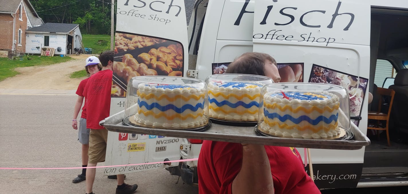 Billy Hanisch delivered personalized cakes for the high school graduates in Plum City, Wis.