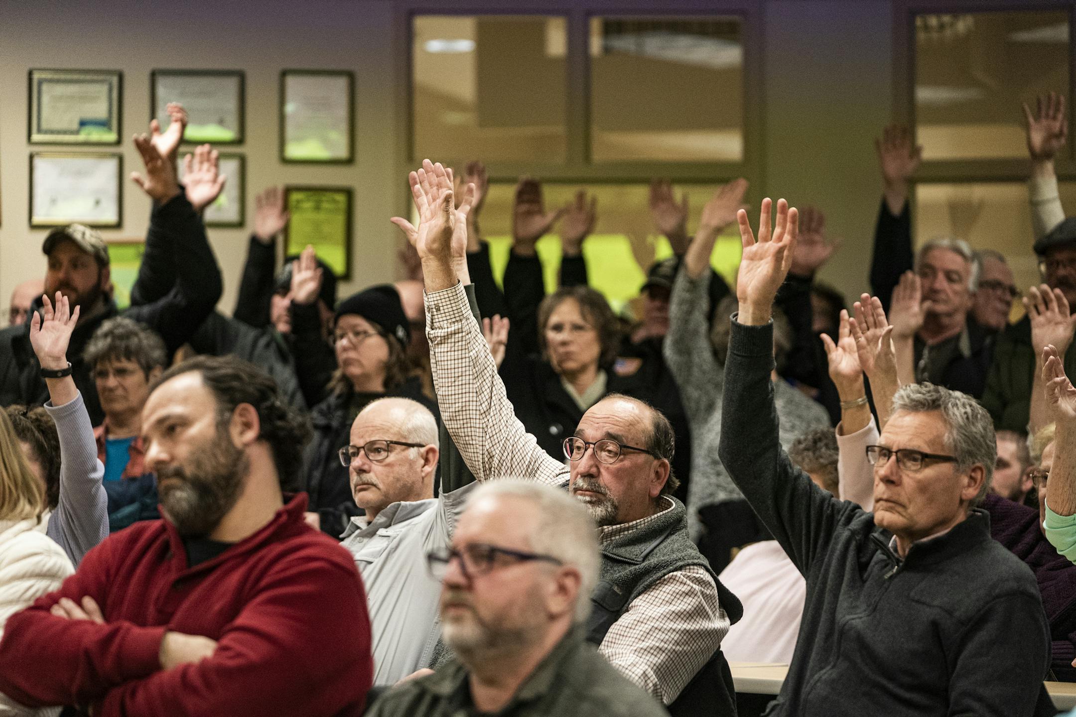 Those who approved a motion to refuse refugee resettlement raised their hands in the overcapacity crowd in attendance.] Beltrami County is the latest in Minnesota to vote on refugee resettlement -- and may be the first in Minnesota to ban it under the new Trump adminstration policy.RICHARD TSONG-TAATARII &#xa5; richard.tsong-taatarii@startribune.com