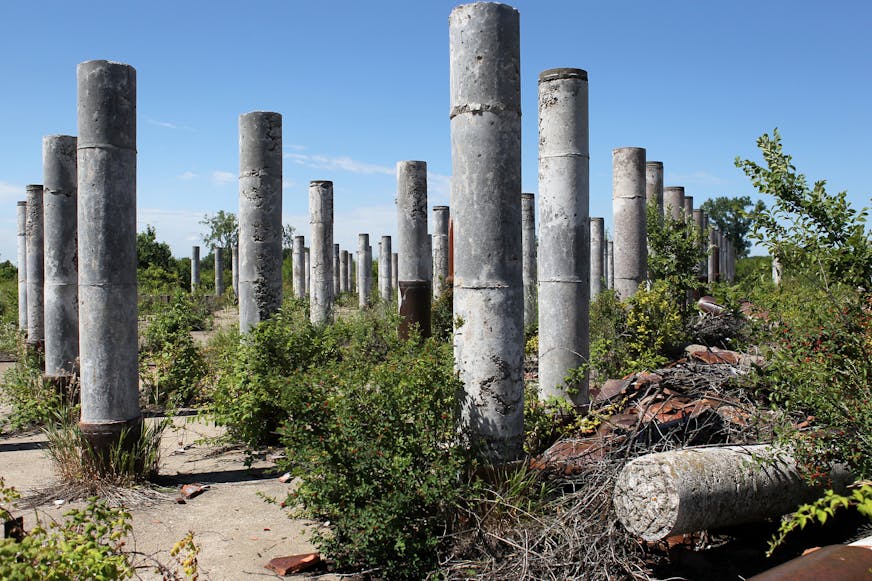 Ruins of an ammunition plant sit on a portion of the UMore Park property in Rosemount, Minn., on Tuesday, July 23, 2013. ] (ANNA REED/STAR TRIBUNE) anna.reed@startribune.com (cq)