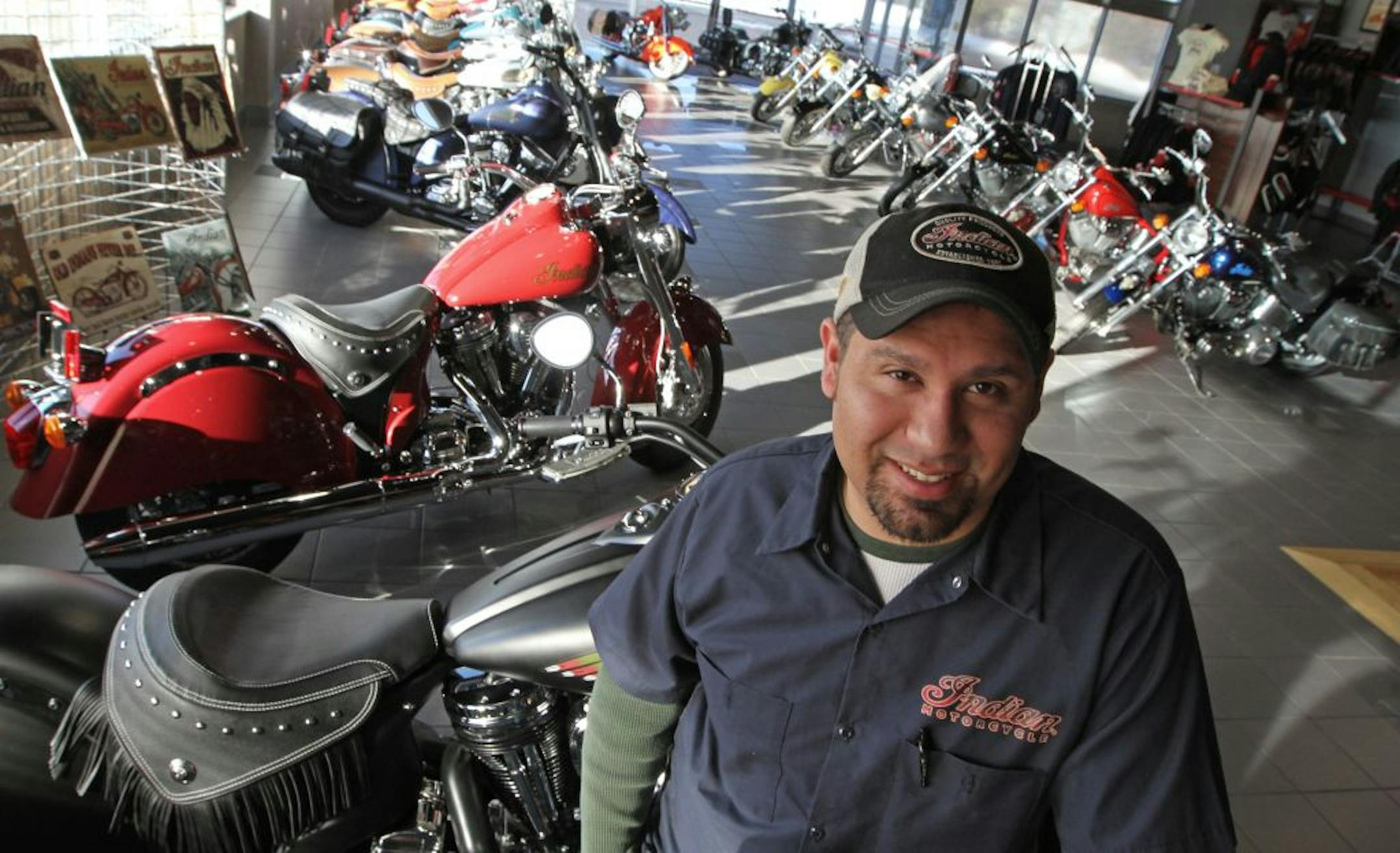 Art Welch, co-owner of Indian Motorcycle Twin Cities in the St. Paul showroom on 1/10/13.