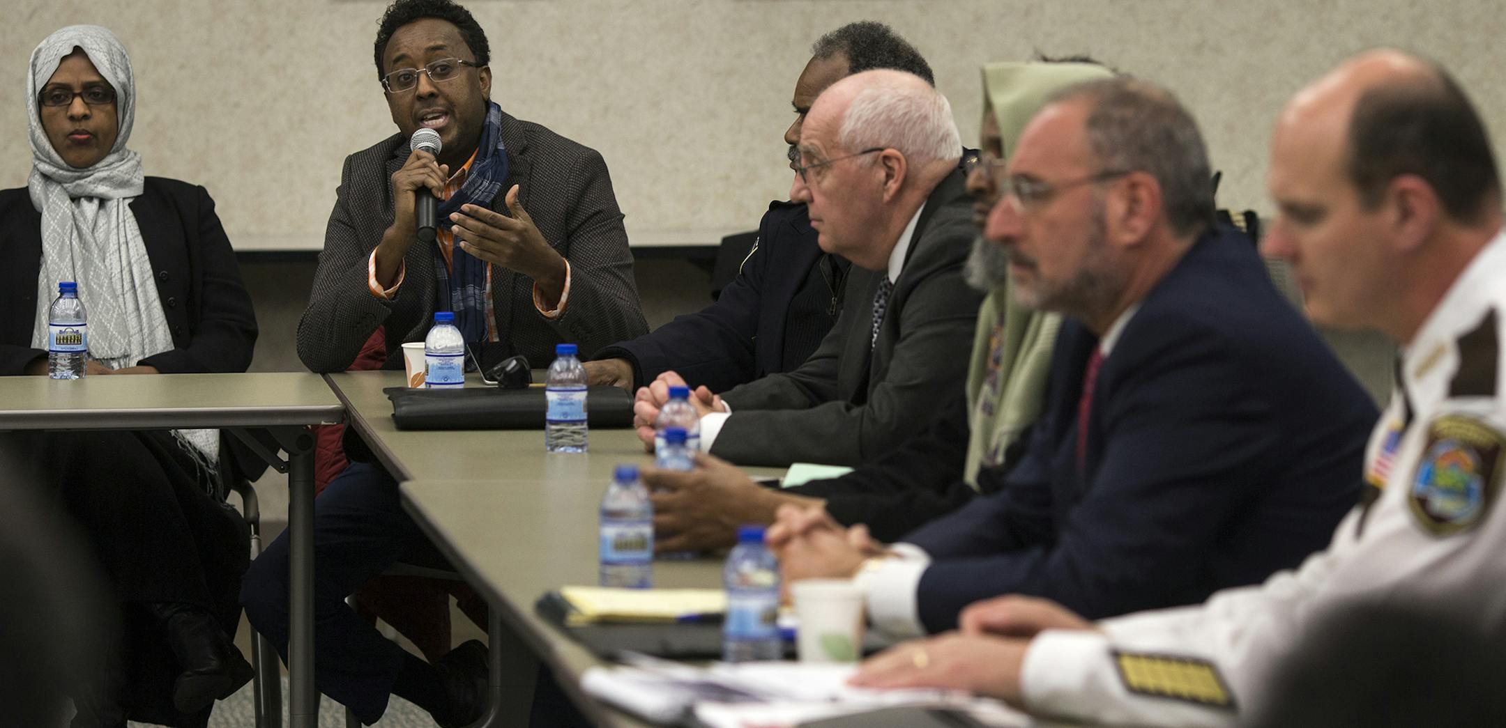 Hashi Shafi, executive director of Somali Action Alliance spoke to the group at the Hennepin County Safety Center on Thursday, March 24, 2016, in Minneapolis, Minn. ] RENEE JONES SCHNEIDER • reneejones@startribune.com Federal, state and local law enforcement leaders met with local imams and Muslim community leaders in light of this week's attacks in Brussels and heightened security. ORG XMIT: MIN1603241910399039