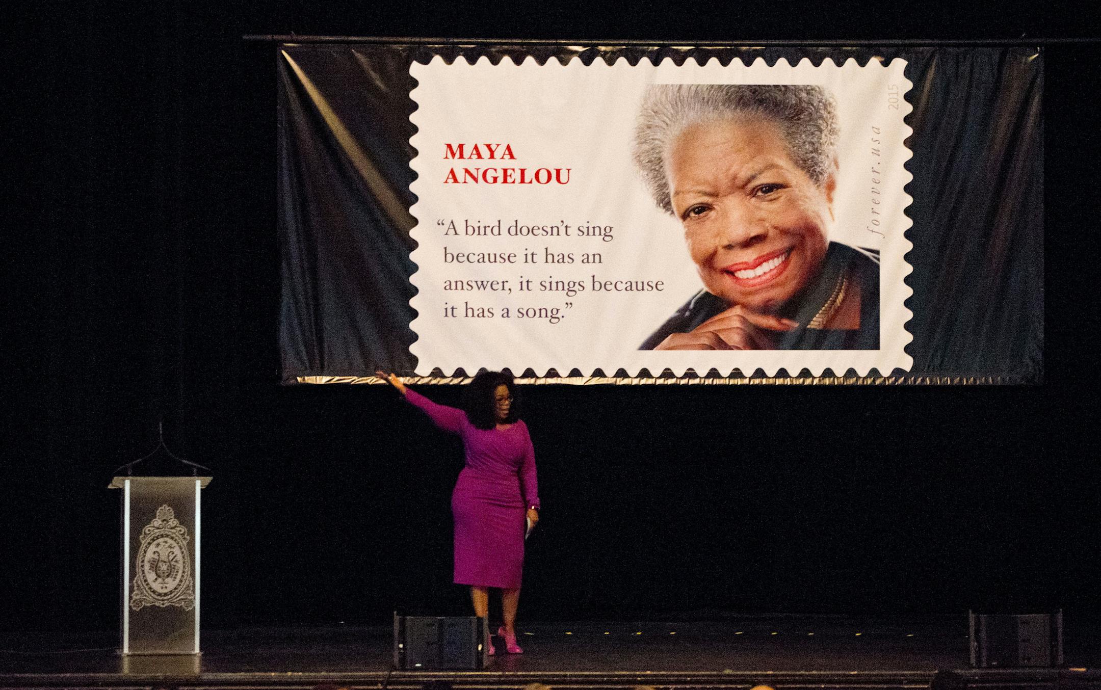 Oprah Winfrey gestures up as the lights go out during her speech at the unveiling of the Maya Angelou Forever Stamp, Tuesday, April 7, 2015, at the Warner Theater in Washington. The White House, State Department, and Capitol were all affected by reports of widespread power outages across Washington and its suburbs Tuesday afternoon. (AP Photo/Jacquelyn Martin)