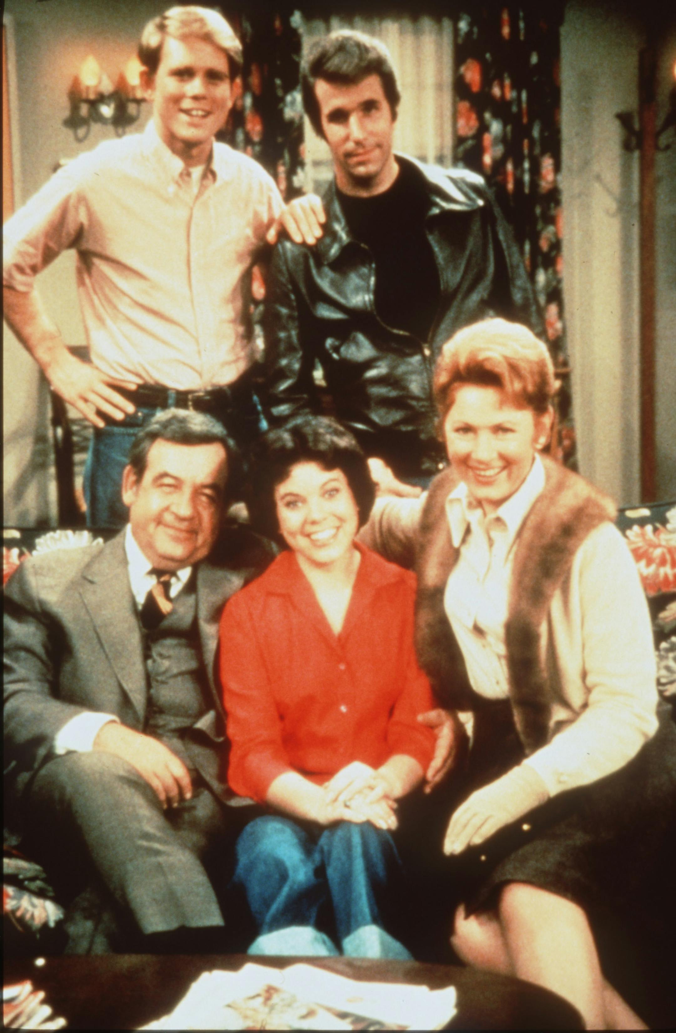 Shown are some of the main characters from the television show "Happy days." Seated are Tom Bosley as Howard Cunningham, Erin Moran as Joanie, and Marion Ross as Marion Cunningham. Standing in back are Ron Howard as Richie, and Henry Winkler (as the Fonz, or Fonzie). Handout photo.