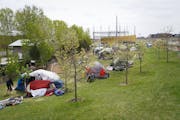 What began in March as a small camp consisting of about a couple dozen homeless adults has now swelled to more than 100 residents in tents. Known as "