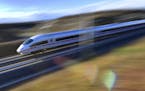 A special Inter City Express train of Deutsche Bahn, DB,drives along the new fast railway track between Munich and Berlin in Erfurt, Germany, Friday, 