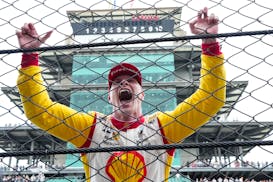 Josef Newgarden celebrates after winning the Indianapolis 500 auto race at Indianapolis Motor Speedway in Indianapolis, Sunday, May 26, 2024. (AP Phot