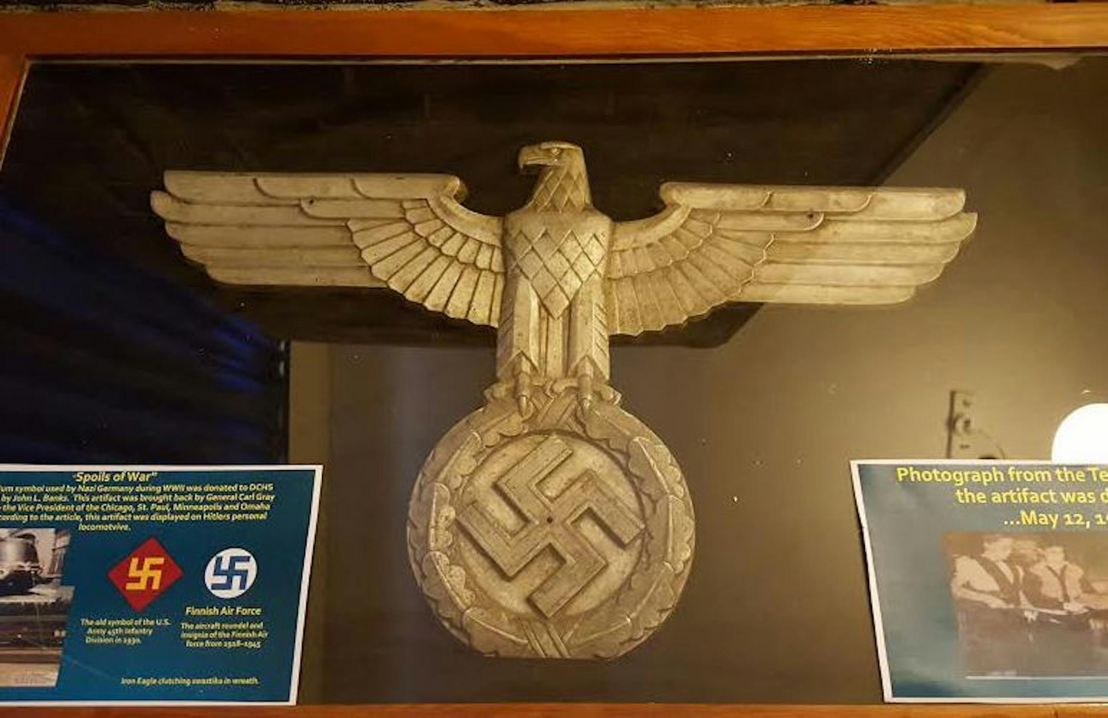 Chromium symbol of an eagle clutching a wreath with a swastika was believed to have once been on Hitler's personal train. The historic item was donated to the Douglas County Historical Society in 1946 and was discovered missing in 2014.