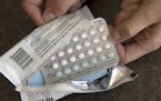 FILE - In this Aug. 26, 2016, file photo, a one-month dosage of hormonal birth control pills is displayed in Sacramento, Calif. The Trump administrati