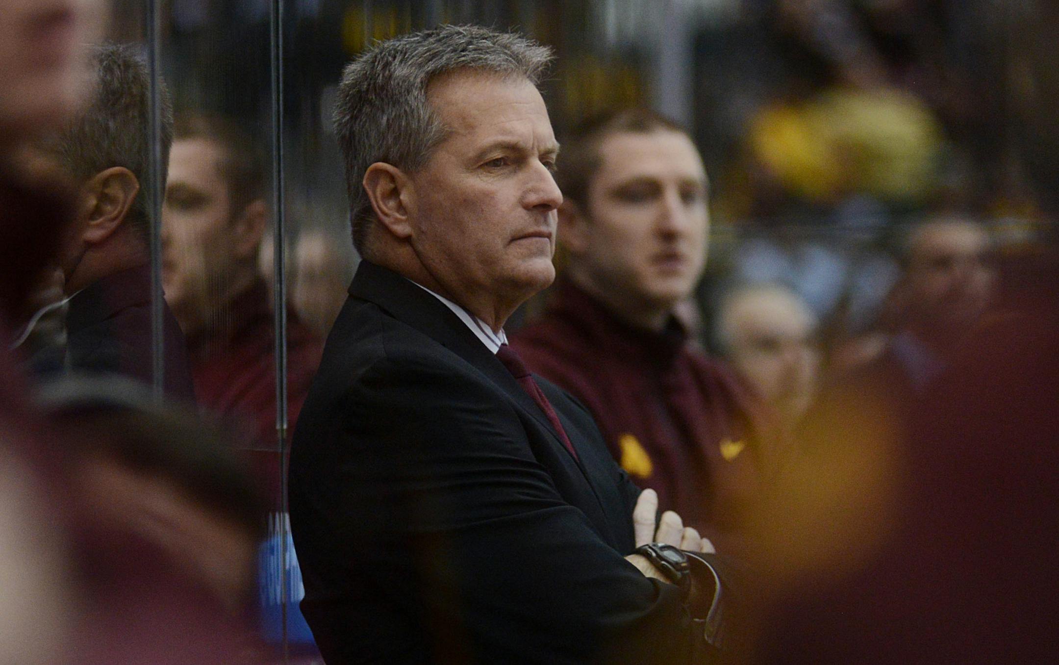 Gophers mens' hockey head coach Don Lucia watches his team play. ] During the first period. BRIDGET BENNETT SPECIAL TO THE STAR TRIBUNE • bridget.bennett@startibune.com Gophers versus Michigan State on Friday, Feb. 27, 2015 at Mariucci Arena at the University of Minnesota. Score after first period 0-0 904192 UPUK022815