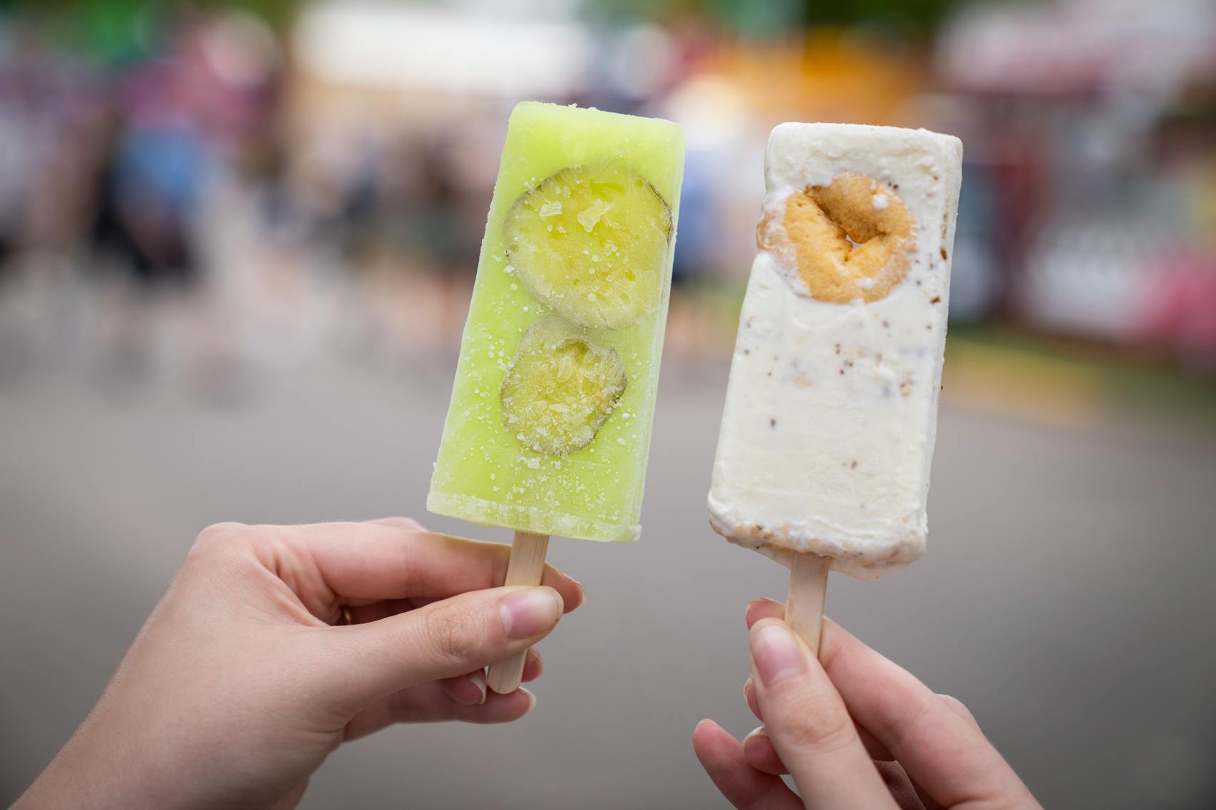Dill PIckle Lemonade, left, and Mini Donut Paletas from Hamline Church Dining Hall. The new foods of the 2023 Minnesota State Fair photographed on the first day of the fair in Falcon Heights, Minn. on Tuesday, Aug. 8, 2023. ] LEILA NAVIDI • leila.navidi@startribune.com