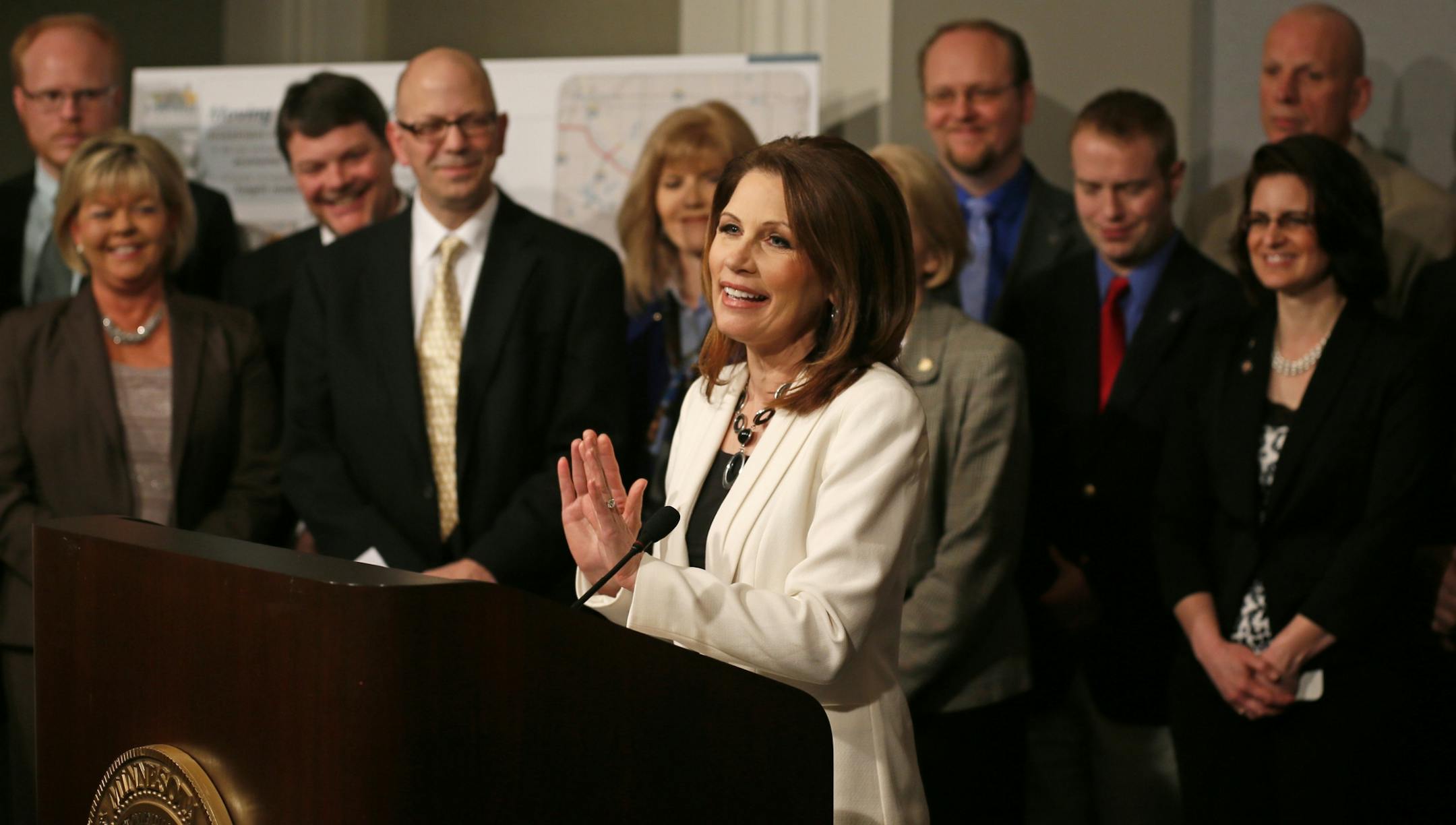 U.S. Rep. Michele Bachmann, flanked by key stakeholders from across Minnesota's Sixth District, spoke during a news conference about 4- to 6-lane expansion on I-94, and Highway 10, Monday March, 18, 2013 in St. Paul.