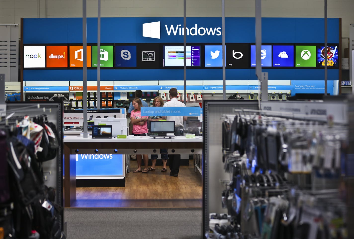 With its recent partnerships with Samsung and Microsoft, Best Buy has been one of the most aggressive proponent of the store within a store concept. The Windows store in Best Buy in Richfield, Minn. on Wednesday, July 10, 2013. ] (RENEE JONES SCHNEIDER * reneejones@startribune.com)