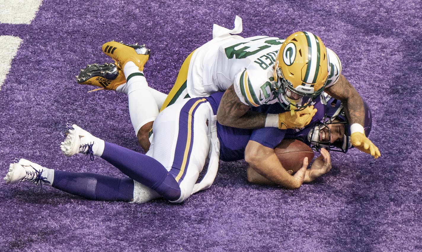 Packers cornerback Jaire Alexander sacked Minnesota Vikings quarterback Kirk Cousins (8) in the endzone for a safety in the second quarter.] Jerry Holt •Jerry.Holt@startribune.com The Minnesota Vikings hosted the Green Bay Packers at U.S. Bank Stadium Sunday September 13,2020 in Minneapolis,MN.