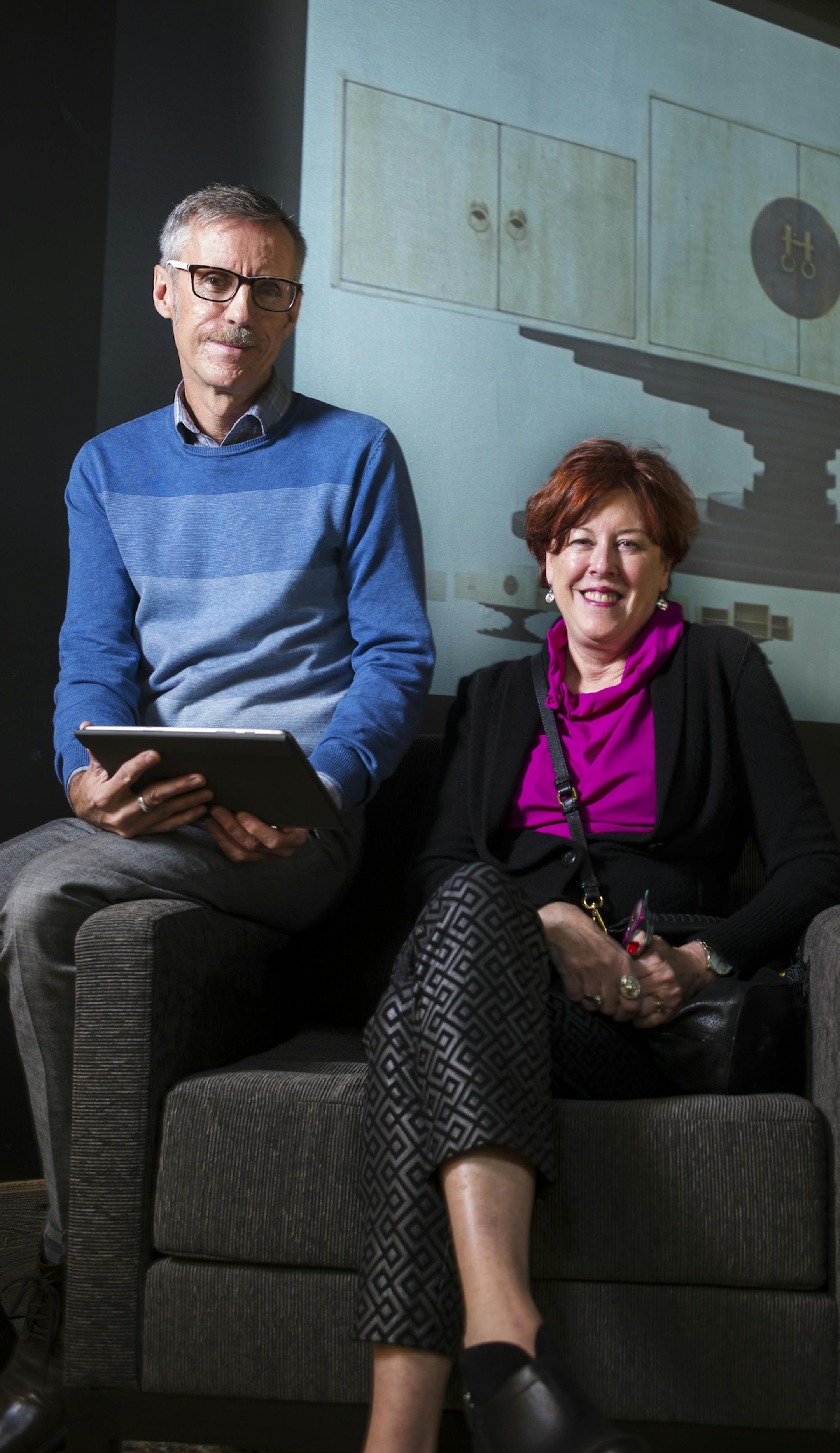 At Habitat, interior designer David Borgula works with client Cookie Coleman. They can pull up life-size images of possible pieces on a large screen without having to thumb through a catalog.] Richard Tsong-Taatarii/rtsong-taatarii@startribune.com
