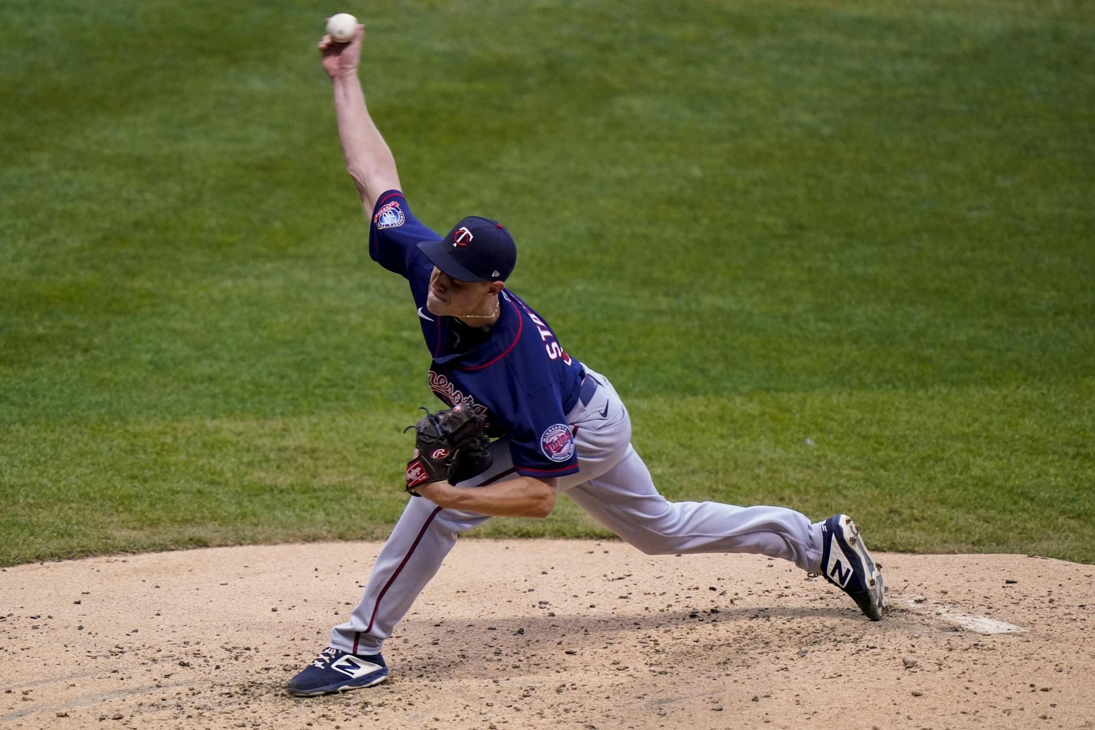 Minnesota Twins relief pitcher Cody Stashak throws during the third inning of a baseball game against the Milwaukee Brewers Tuesday, Aug. 11, 2020, in Milwaukee.