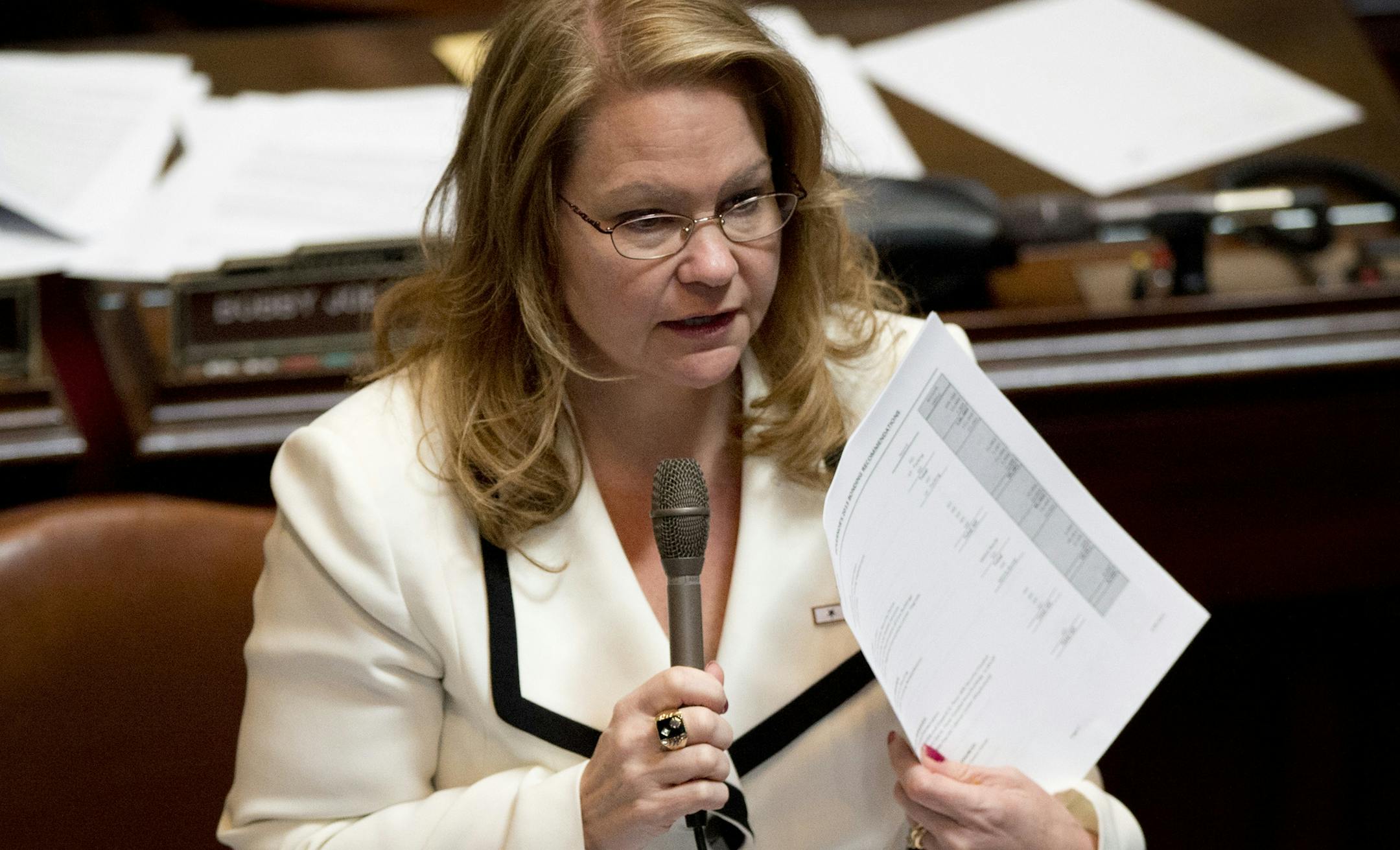 Sen Julianne Ortman, R-Chanhassen held up a copy of the Governors tax bill and spoke about the problems with all of the offered tax bills including the Senate omnibus tax bill that was debated Monday, April 29, 2013. ] GLEN STUBBE * gstubbe@startribune.com