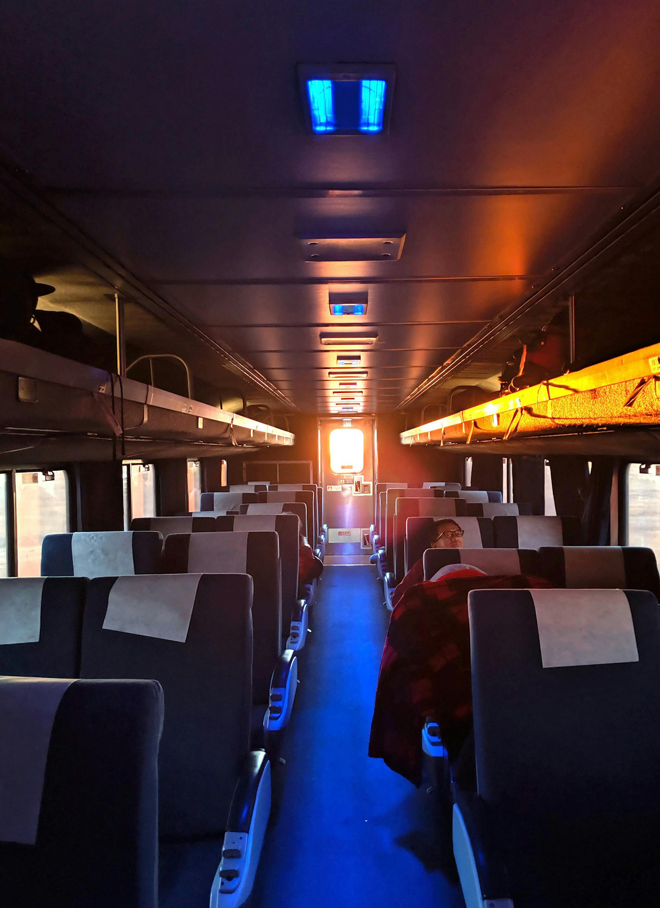Light bursts through the back window of the Southwest Chief's last train car while traveling due west across Kansas at sunrise. (Alexandra Marvar/Chicago Tribune/TNS) ORG XMIT: 1584048