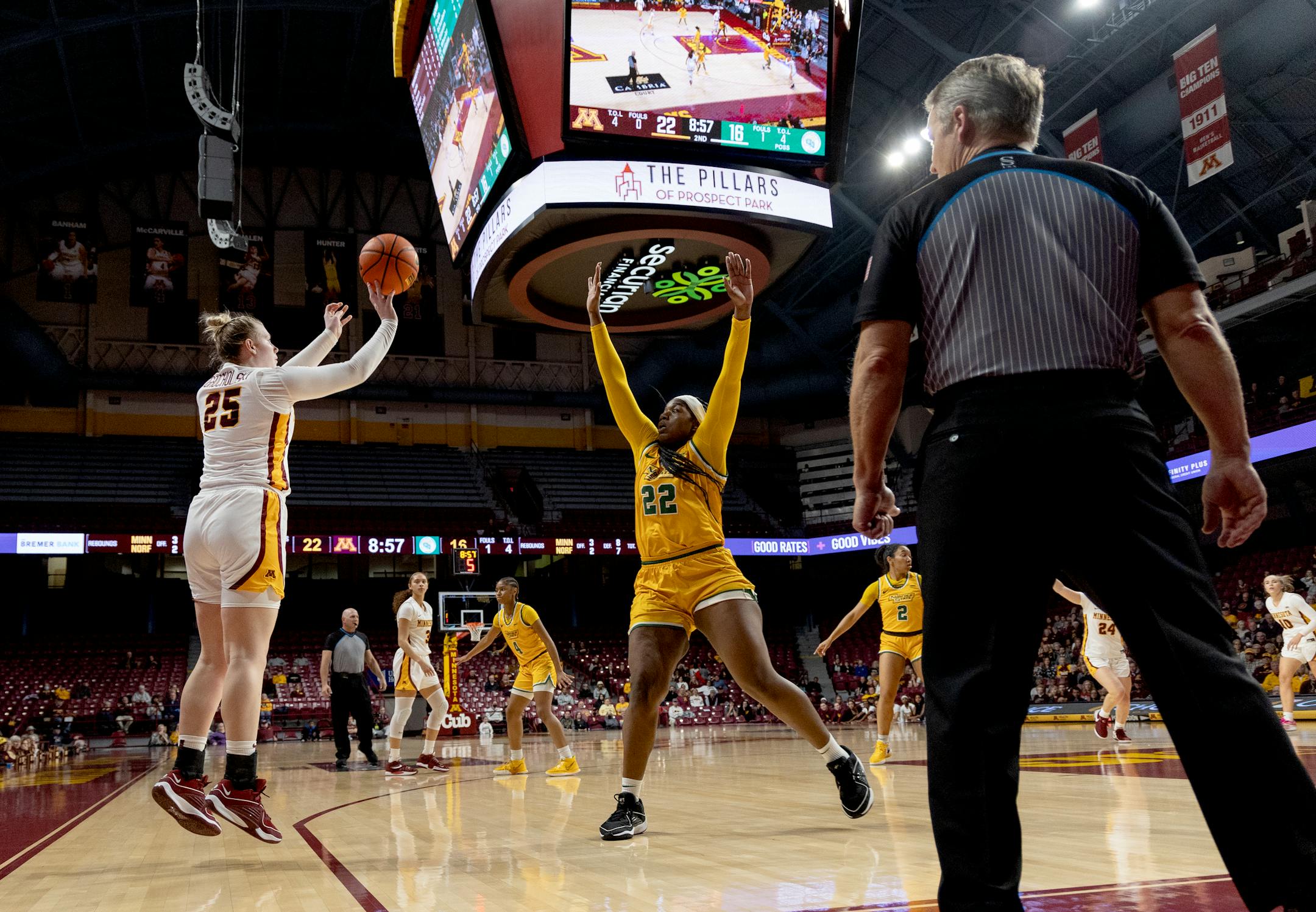 Grace Grocholski (25) of Minnesota makes a three pointer while defended by Kierra Wheeler (22) of Norfolk State in the second quarter Wednesday, November 29, 2023, at Williams Arena in Minneapolis, Minn. ] CARLOS GONZALEZ • carlos.gonzalez@startribune.com