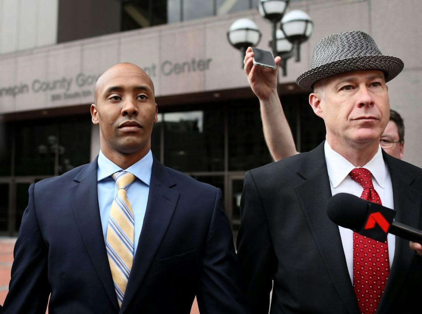 Former Minneapolis police officer Mohamed Noor, left, appeared in Hennepin County District Court with his attorney, Thomas Plunkett but left court without entering a plea to the charges against him in the death of Justine Ruszczyk Damond Tuesday, May 8, 2018, in Minneapolis, MN.