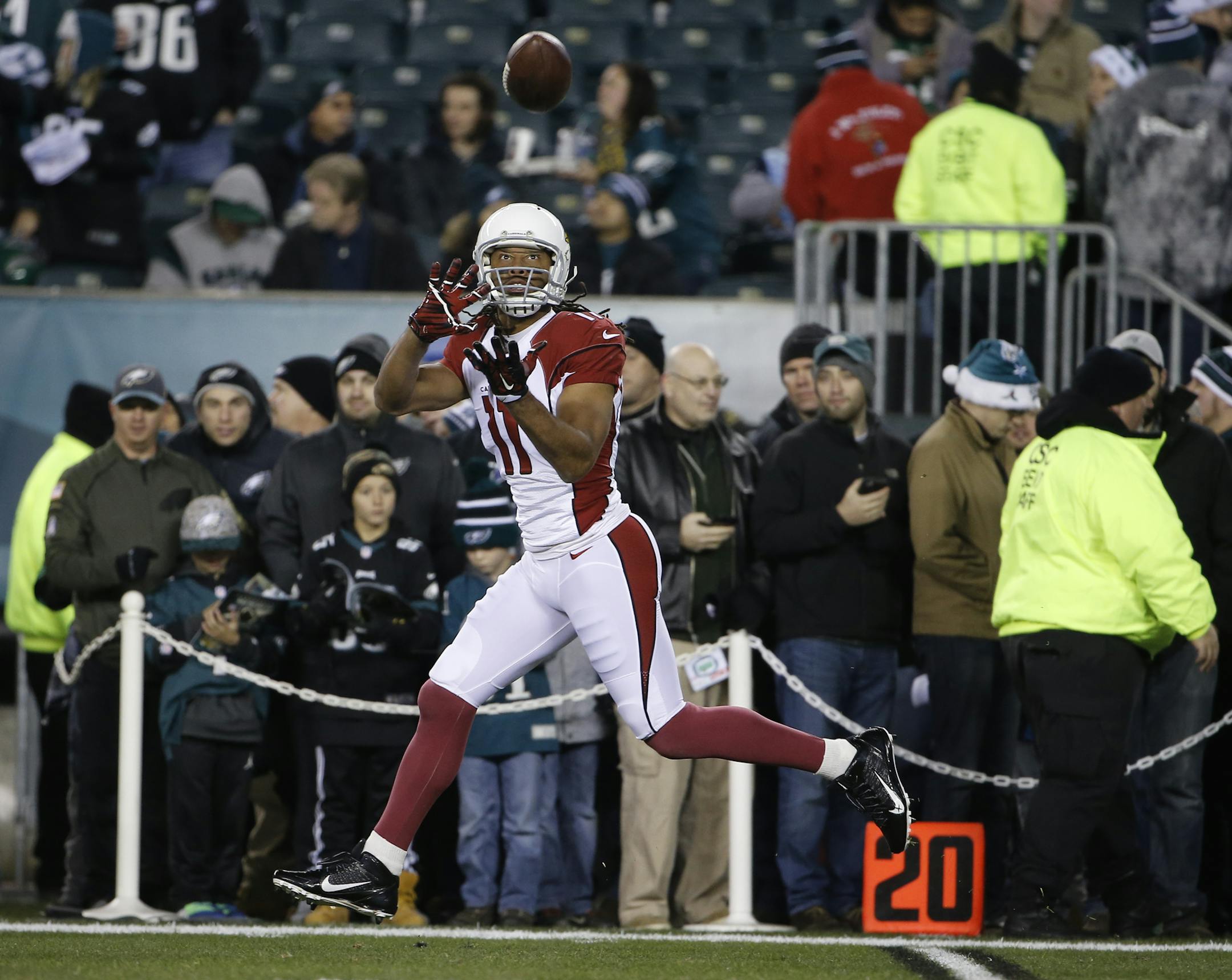 Arizona Cardinals' Larry Fitzgerald warms up before an NFL football game against the Philadelphia Eagles, Sunday, Dec. 20, 2015, in Philadelphia. (AP Photo/Matt Rourke) ORG XMIT: _1AP7905